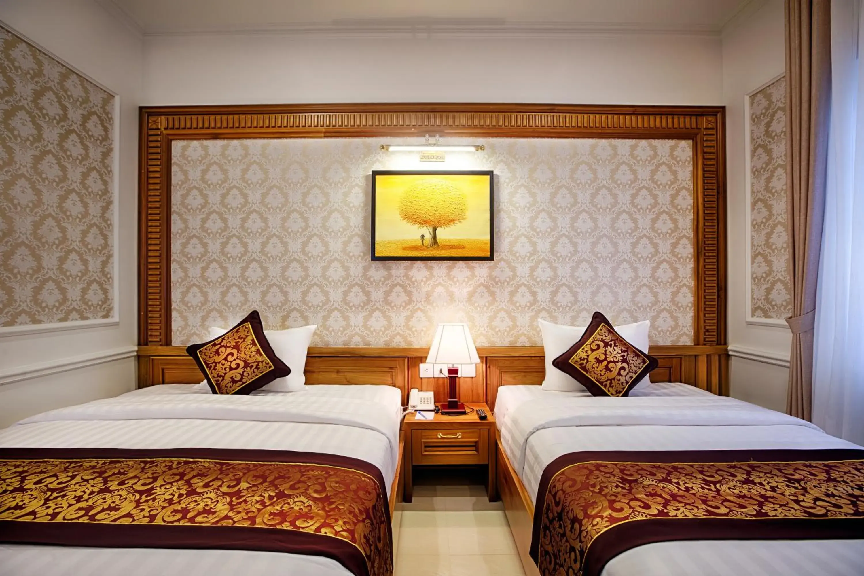 Deluxe Twin Room with River View in Riverside Hotel Quang Binh Deluxe Twin Room with River View in Riverside Hotel Quang Binh