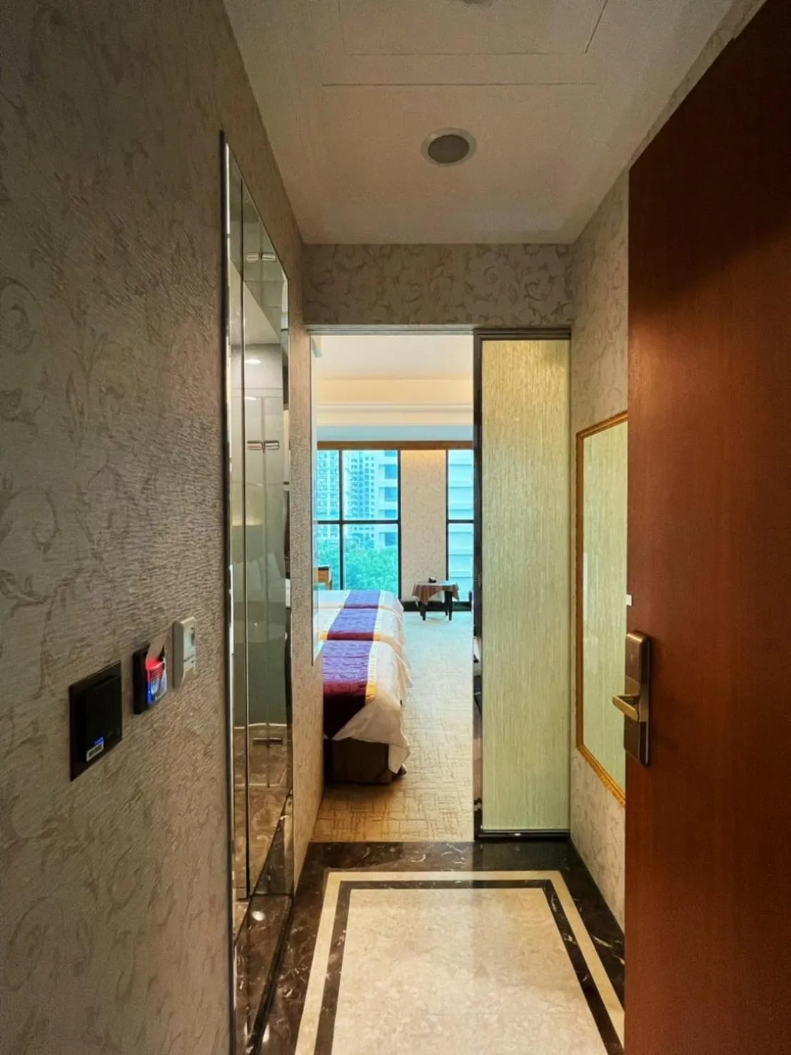 Bed in Happiness Inn Hotel