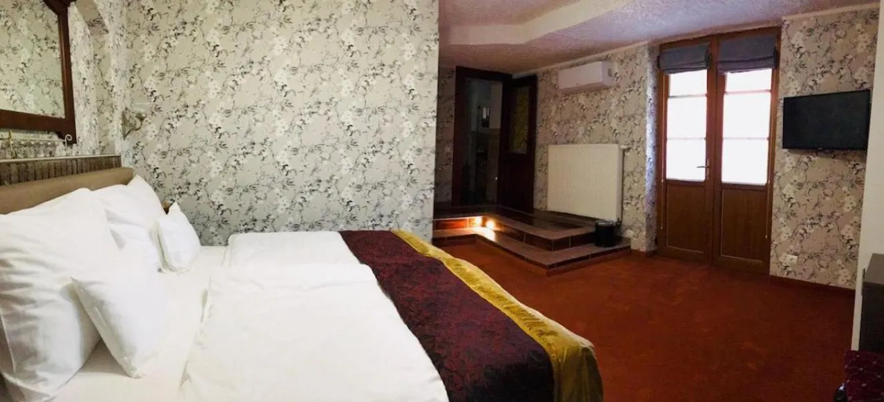 Bed in Erla Villa Boutique Hotel