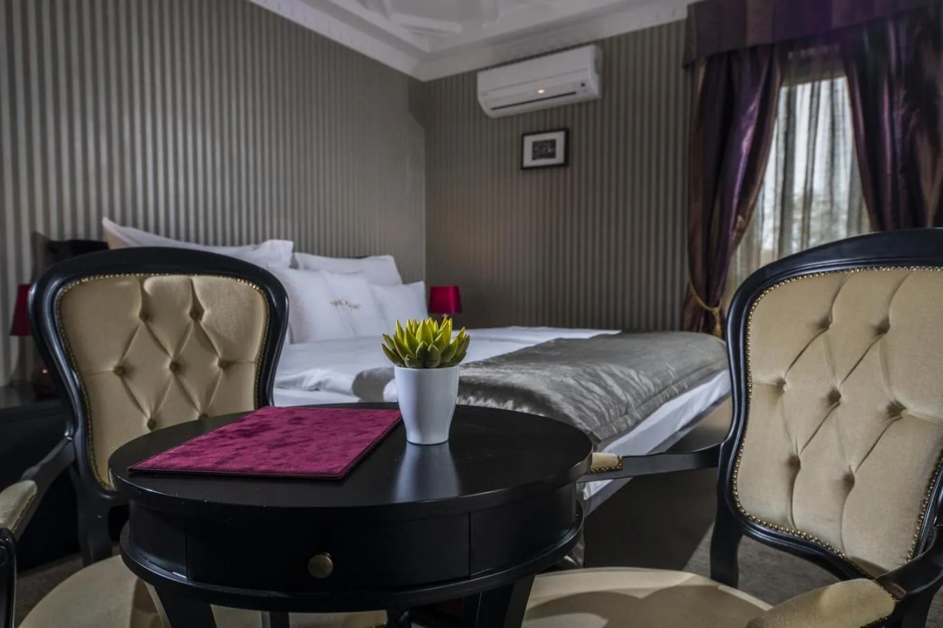 Bed in Erla Villa Boutique Hotel