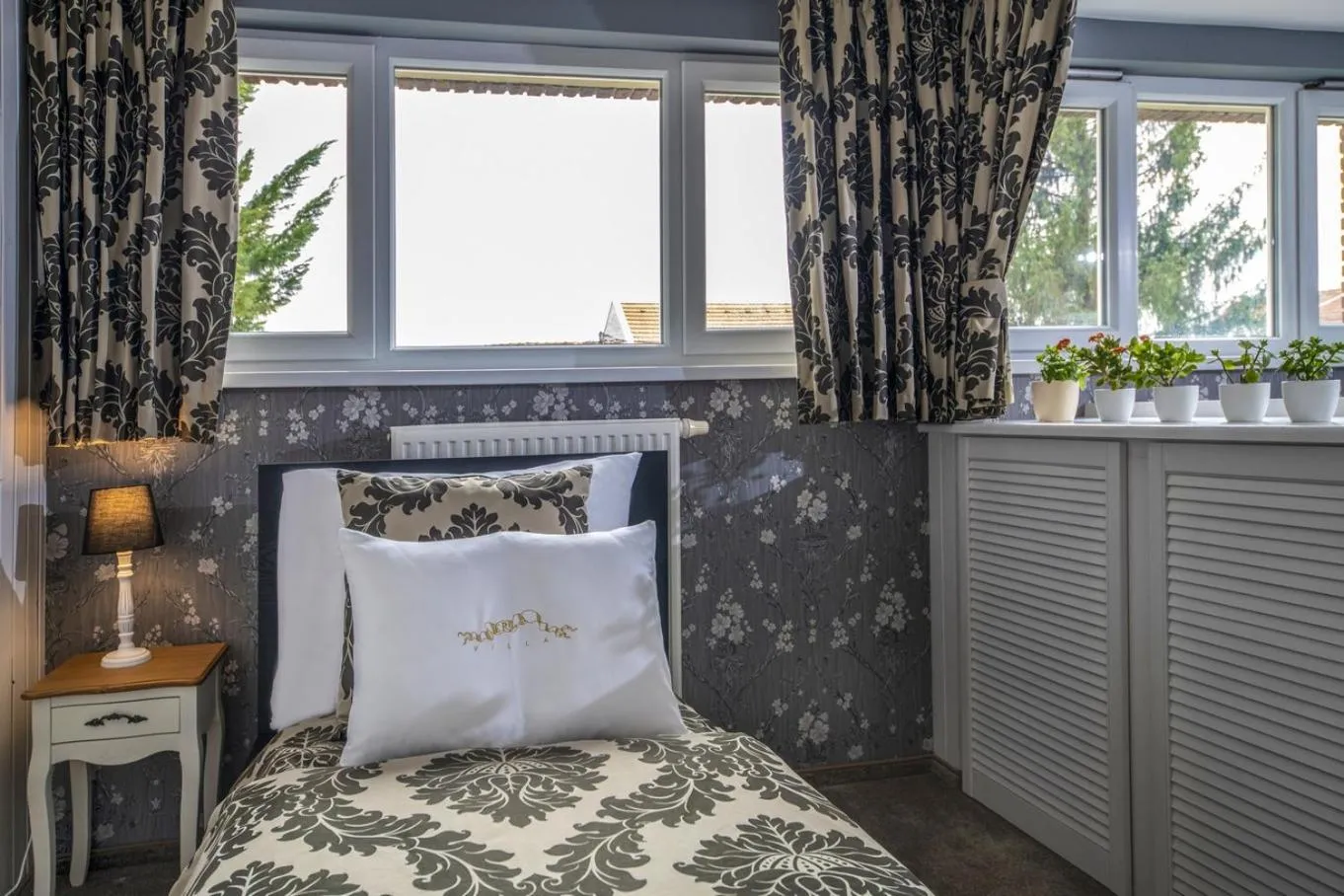 Bed in Erla Villa Boutique Hotel