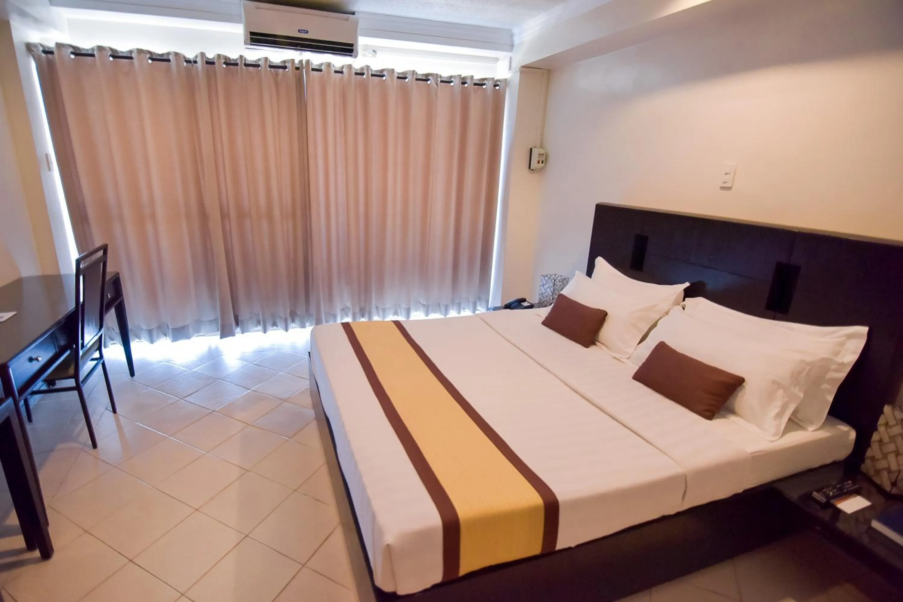 Bed in Hotel Tavern Surigao