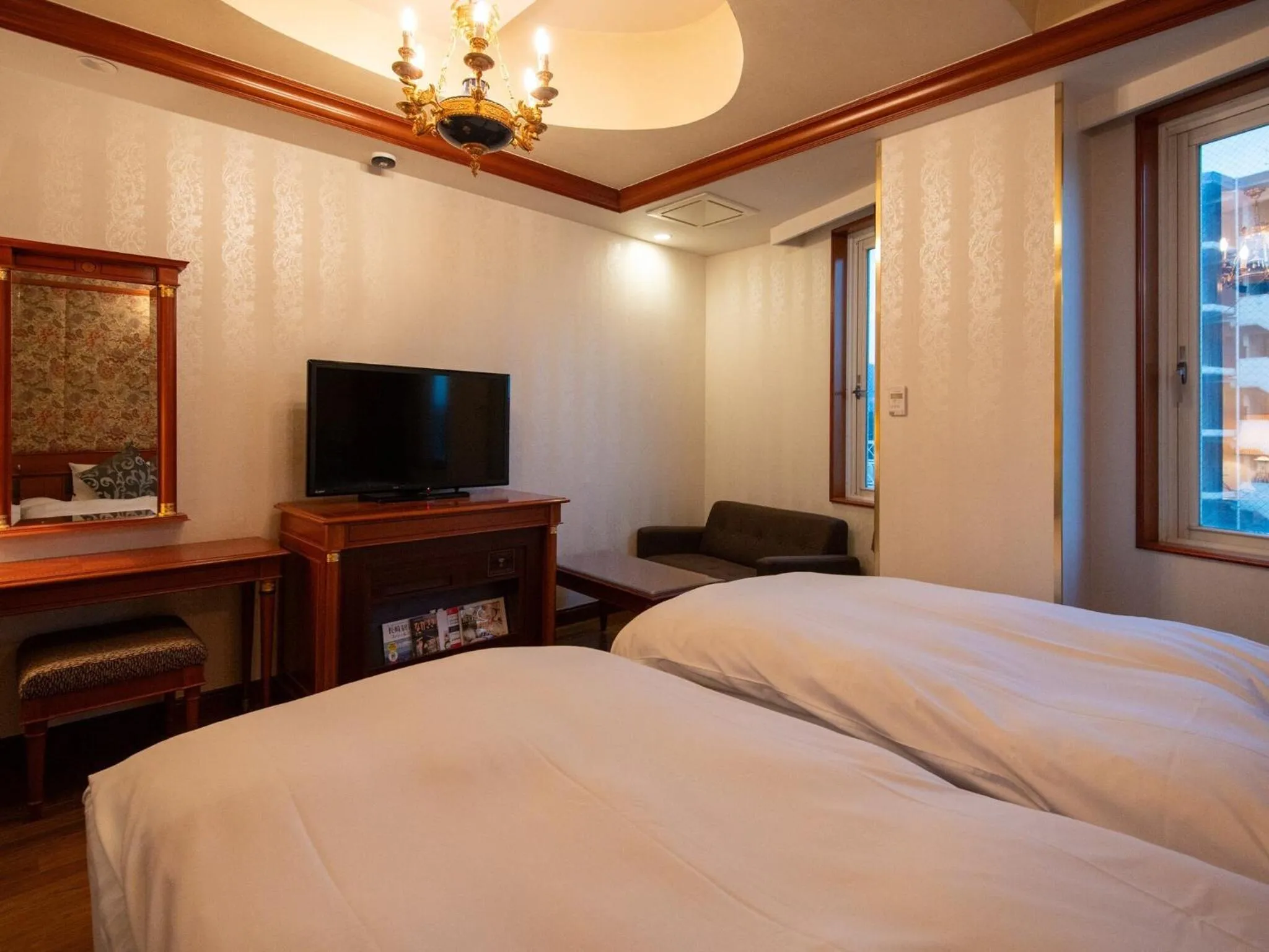 View (from property/room), Bed in Hotel Concerto Nagasaki