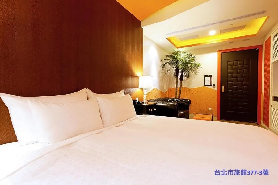 Bed in 探索汽車旅館 延平館 台北市旅館377-3號