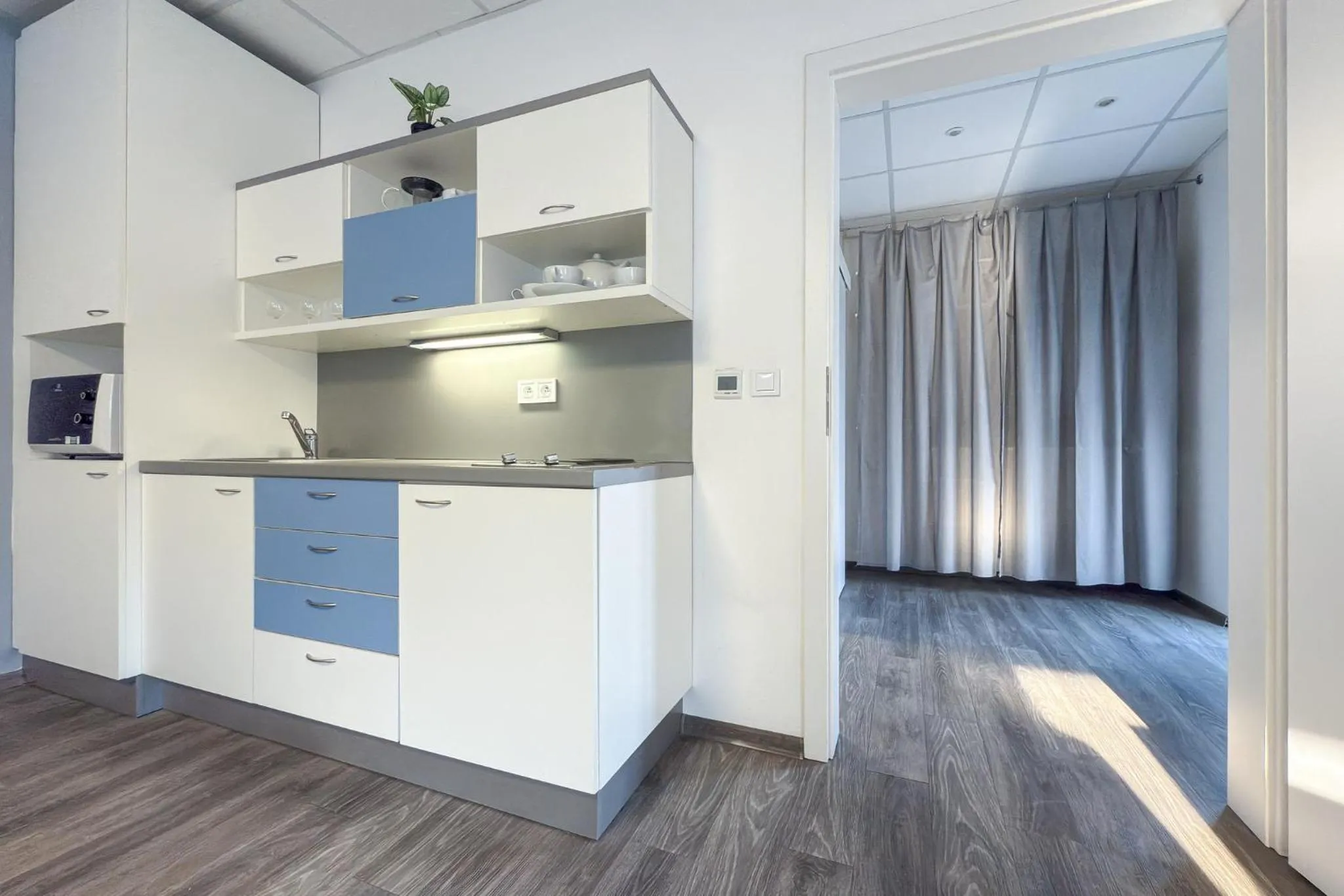 Kitchen or kitchenette in Aparthotel DKS