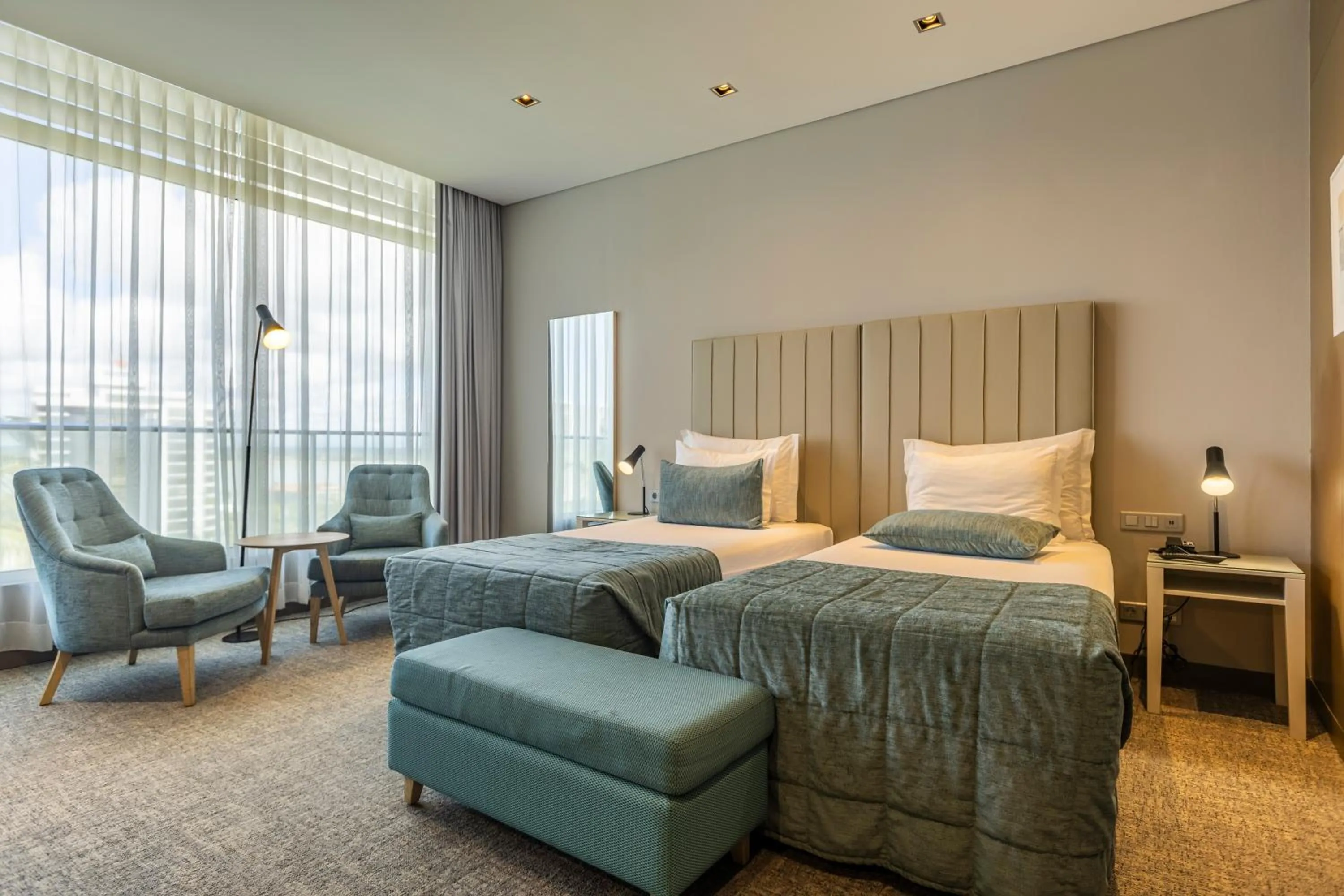 Bed in Montebelo Girassol Maputo Hotel