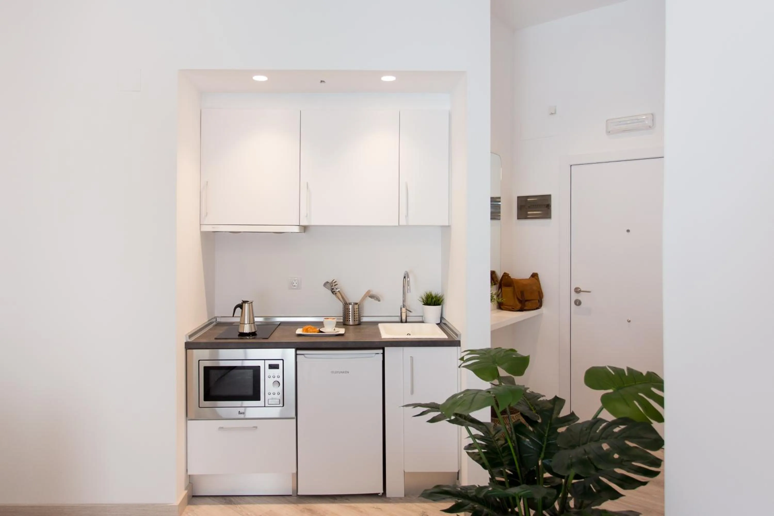 Kitchen or kitchenette in Apartamentos Wallace