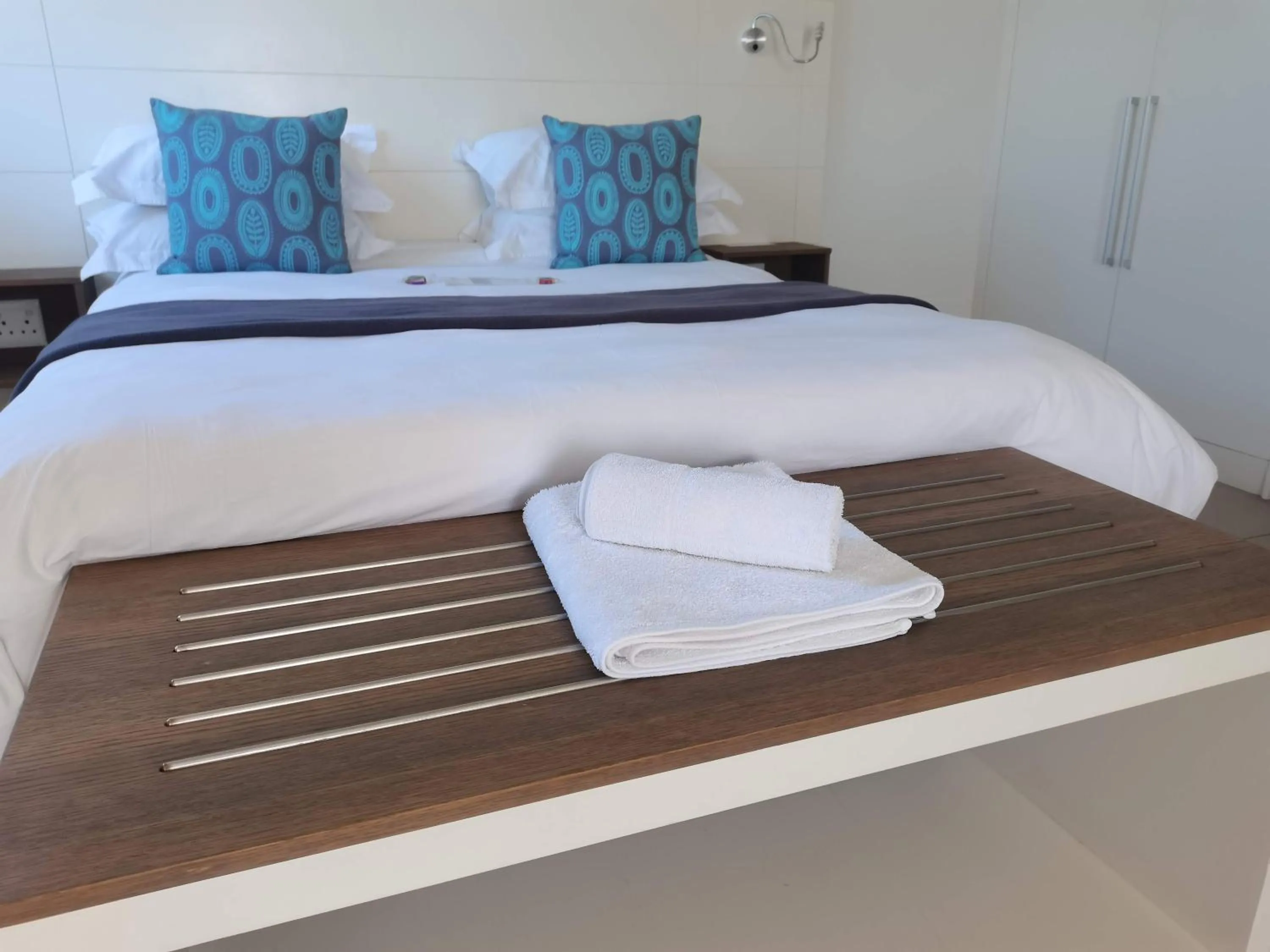 Bed in The Paralian Exclusive Guest House