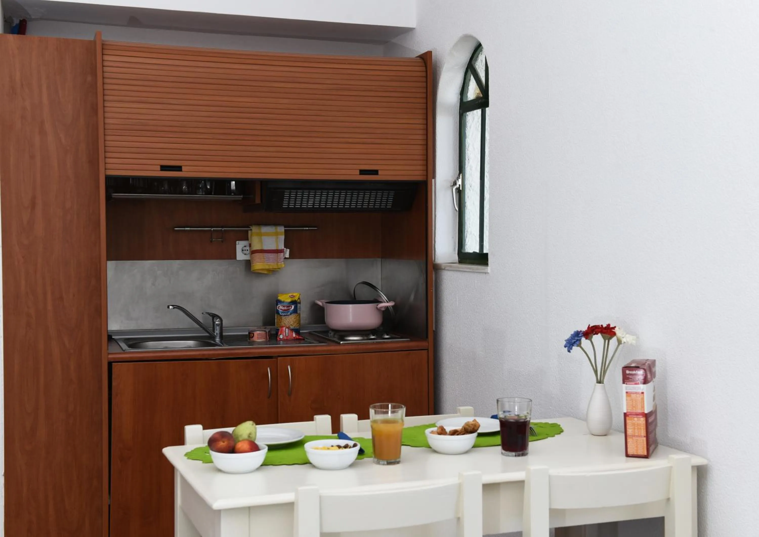 Kitchen or kitchenette in Phaistos Hotel