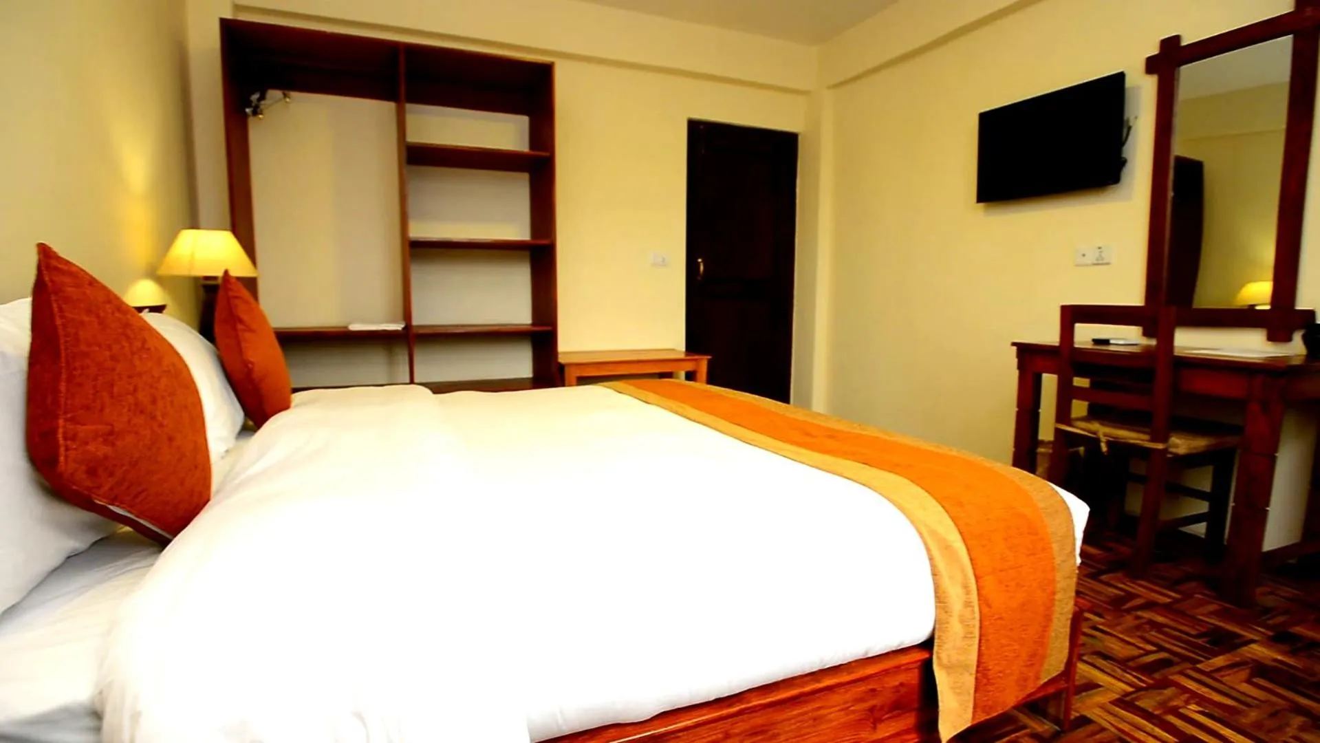 Bed in Hotel Golden Sunrise & Spa