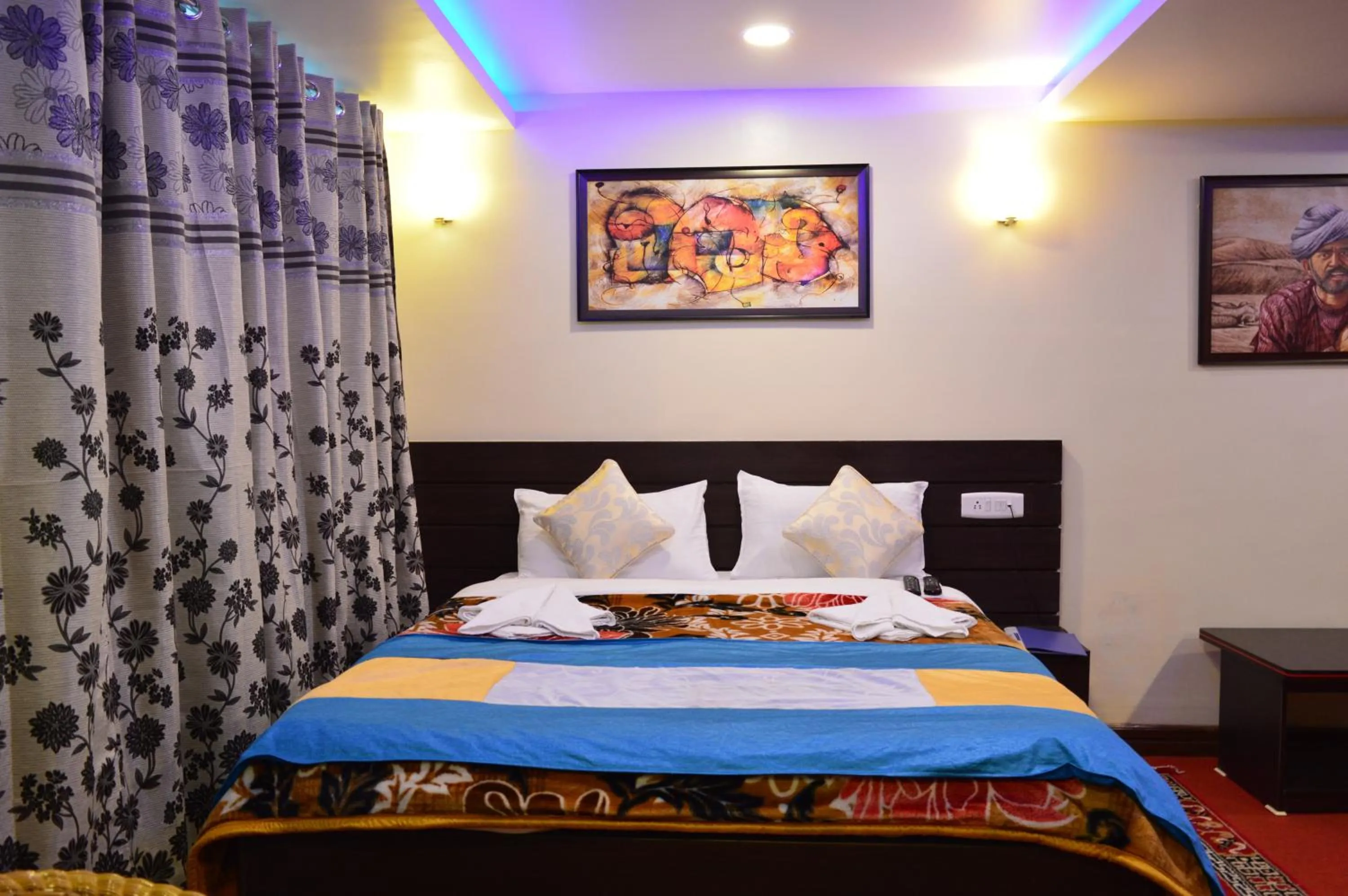 Bed in Hotel Golden Sunrise & Spa