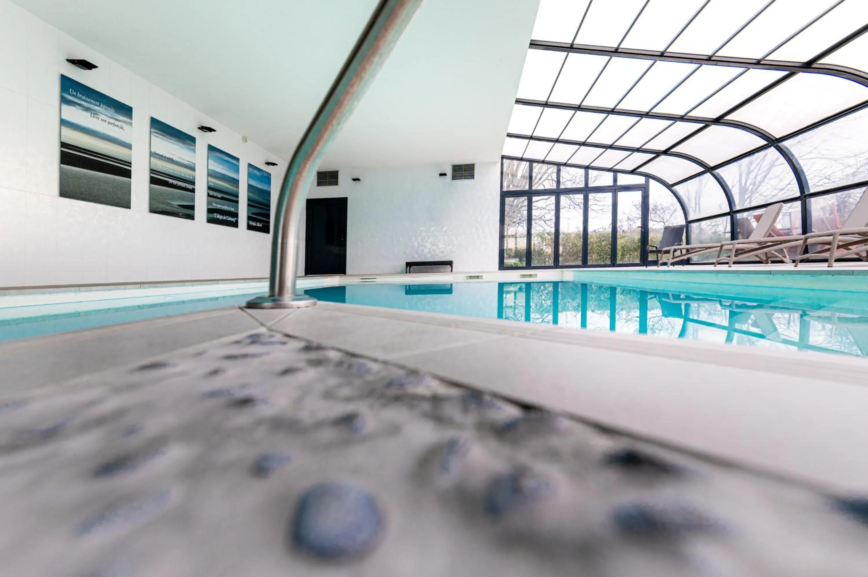 Swimming pool in Kyriad Prestige Residence & Spa Cabourg-Dives-sur-Mer