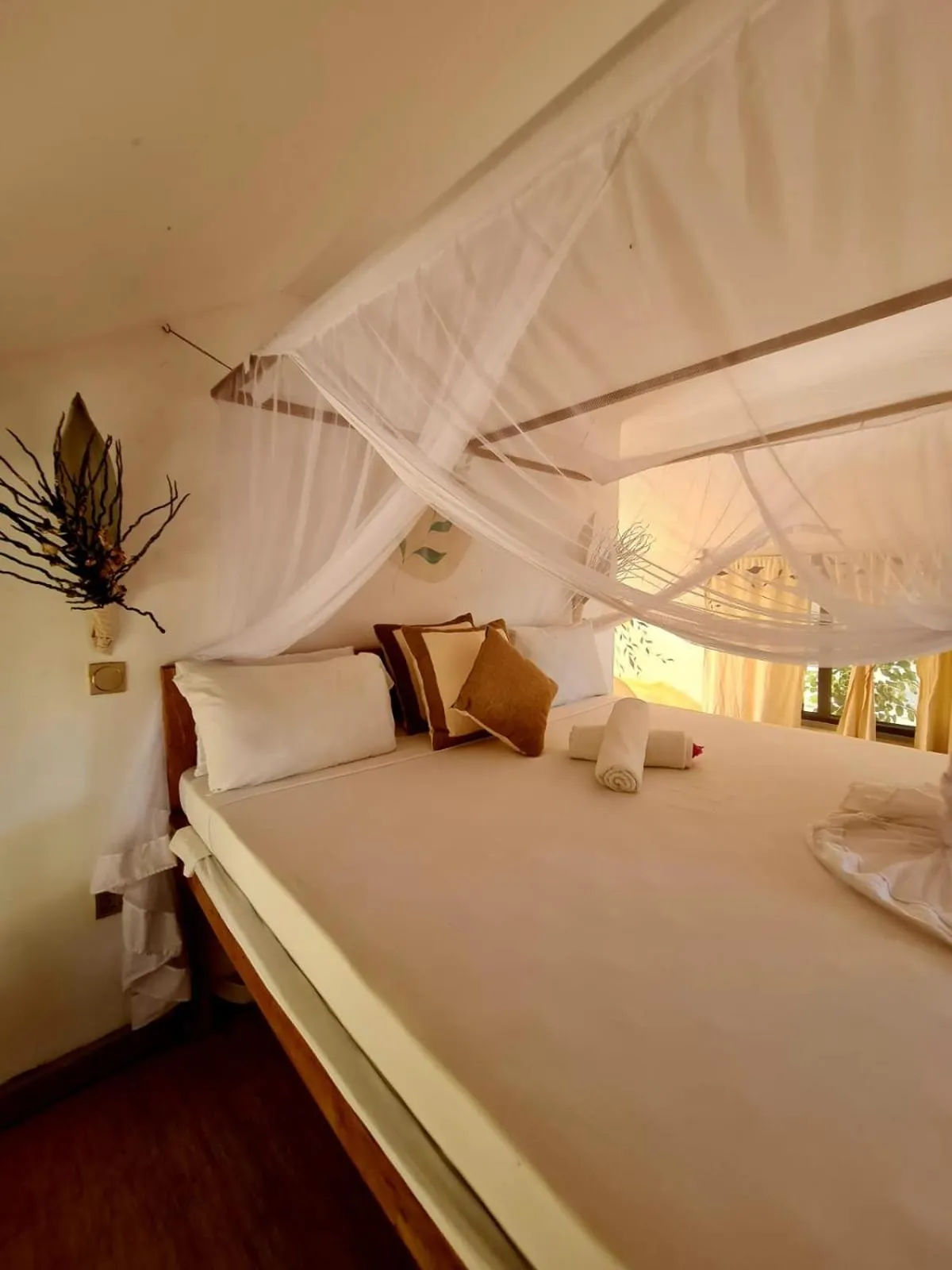 Bed in Kinazi Upepo Beach Eco Sport Resort