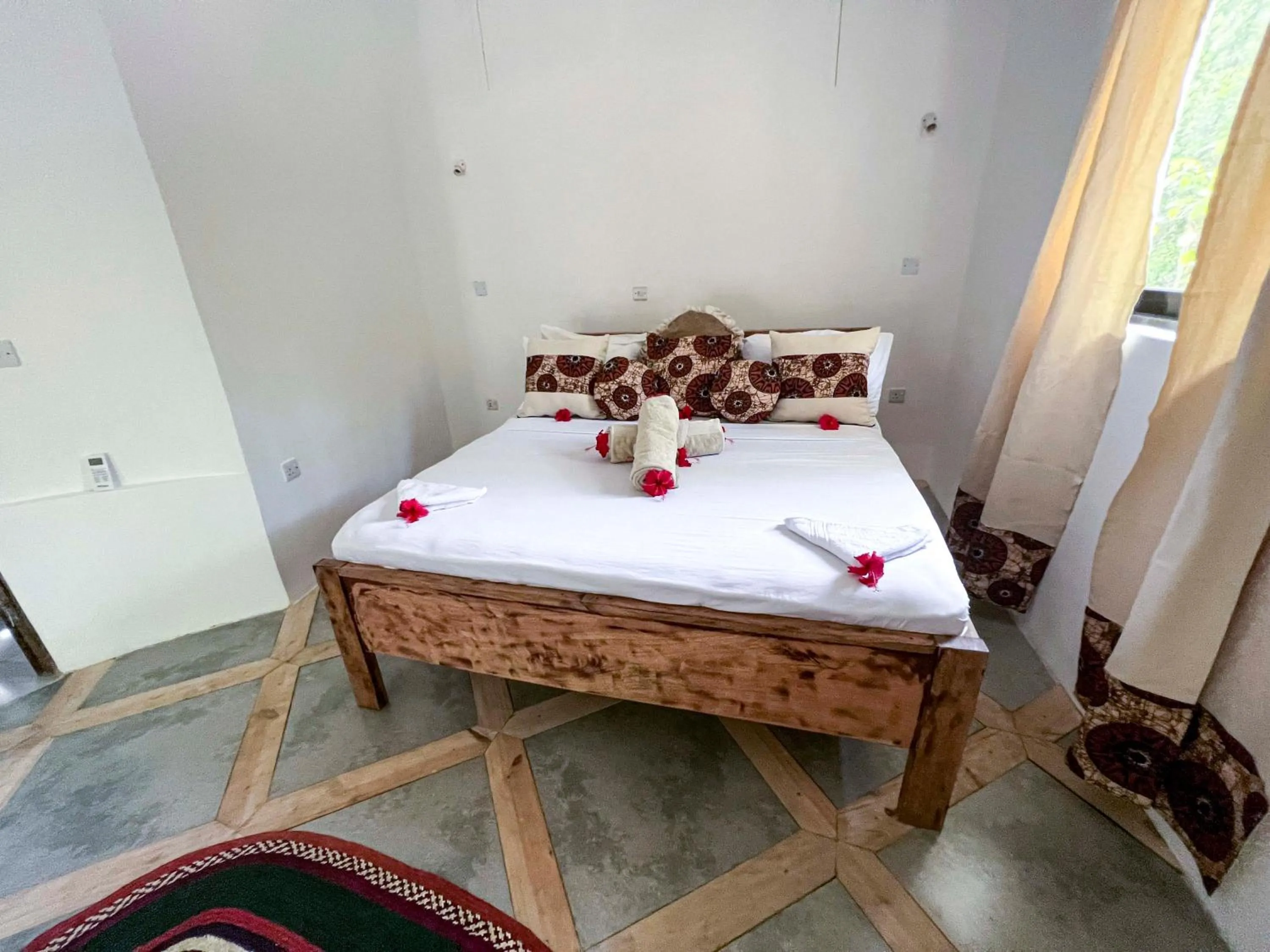 Bed in Kinazi Upepo Beach Eco Sport Resort