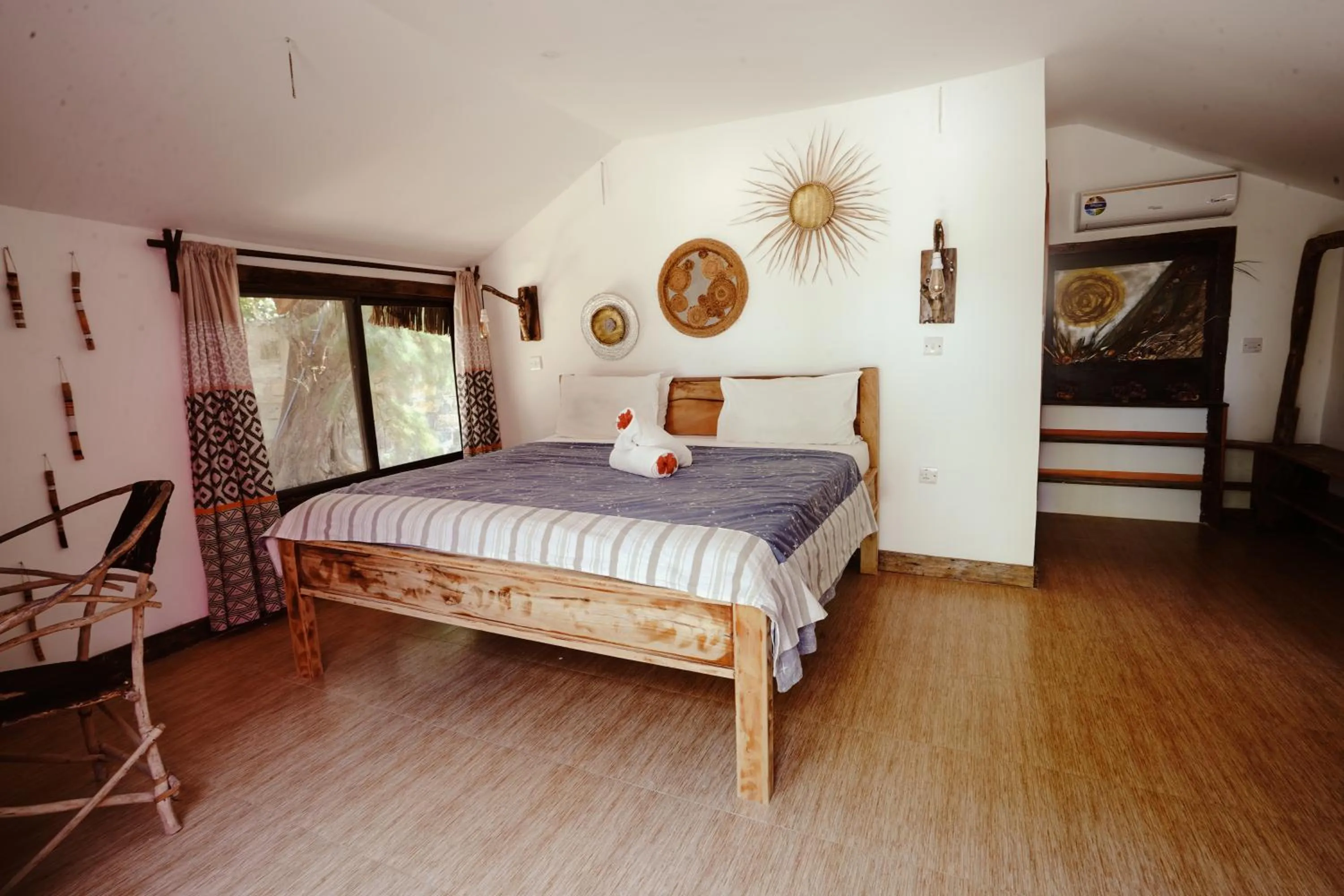 Bed in Kinazi Upepo Beach Eco Sport Resort