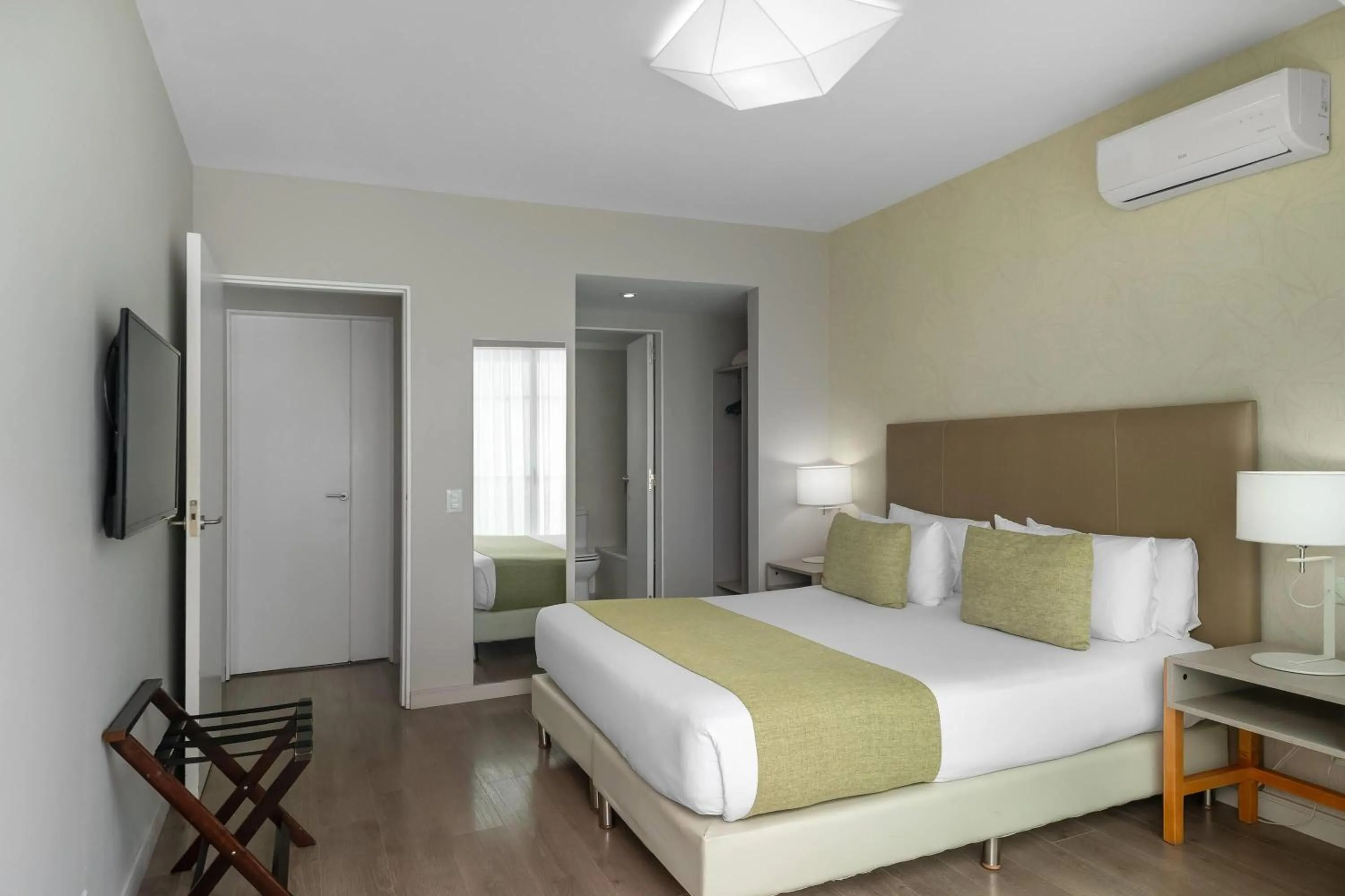 Photo of the whole room, Bed in Dazzler by Wyndham Polo