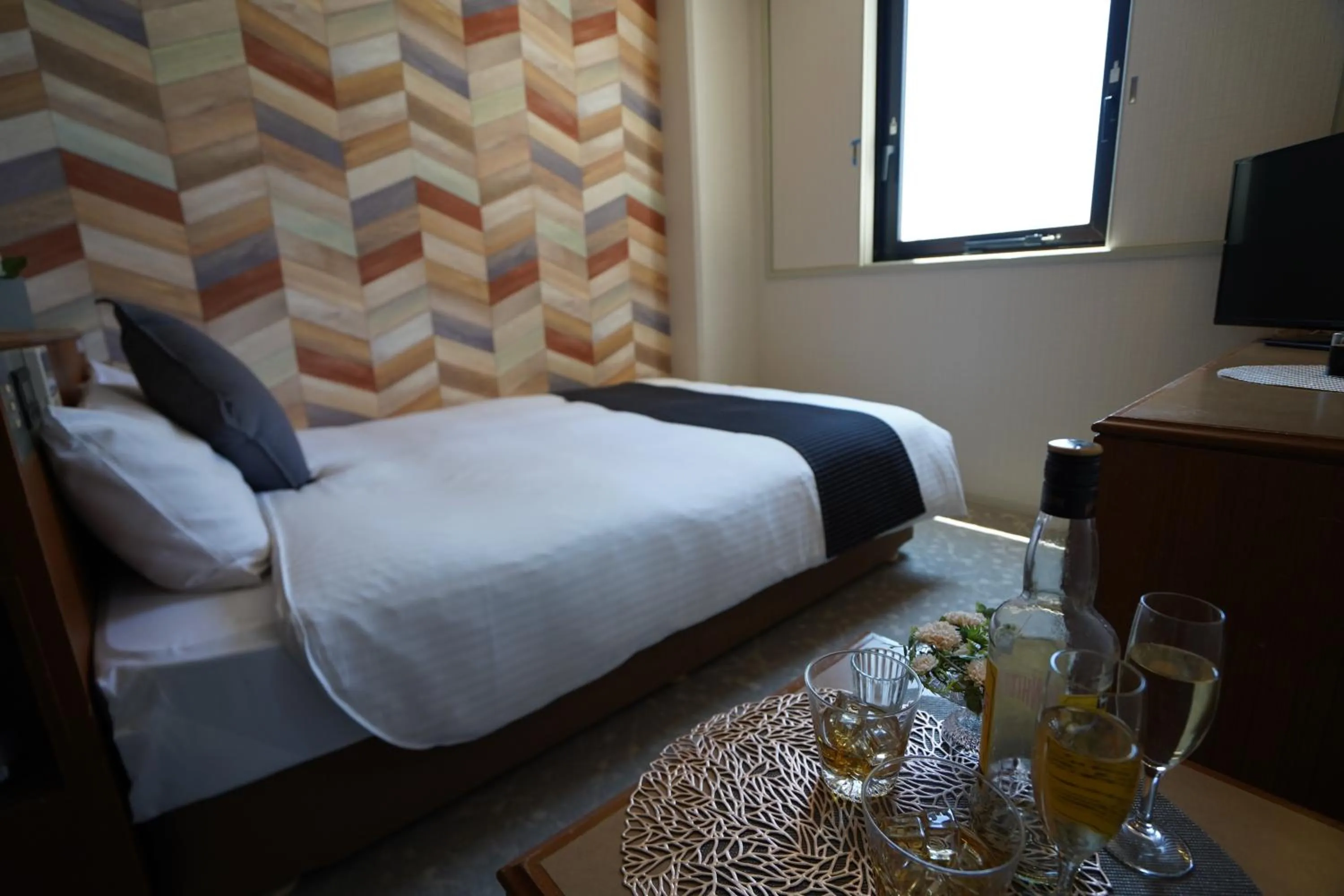 Photo of the whole room, Bed in Hotel New Gaea Itoshima