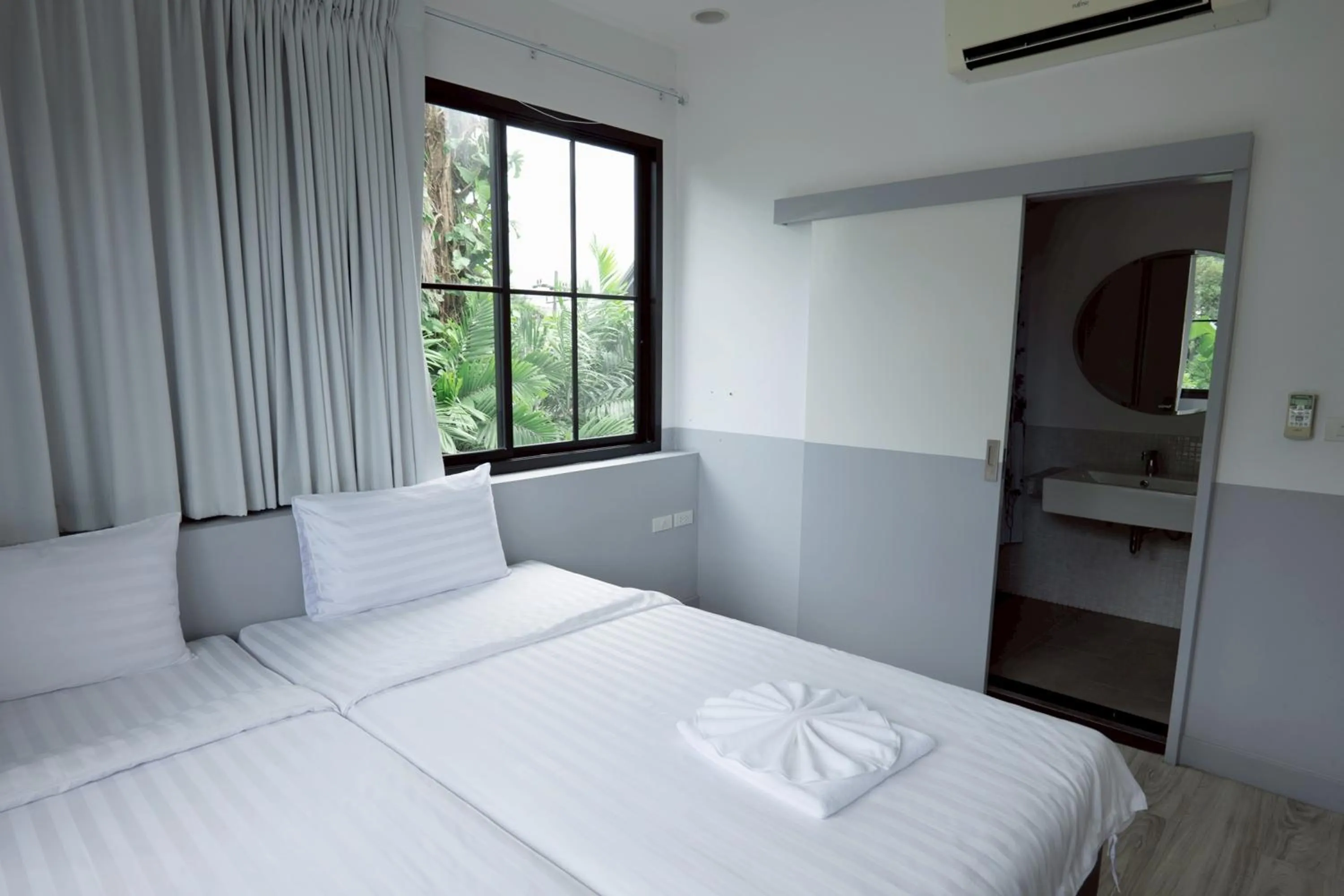 Bed in Surachet at 257 Boutique House