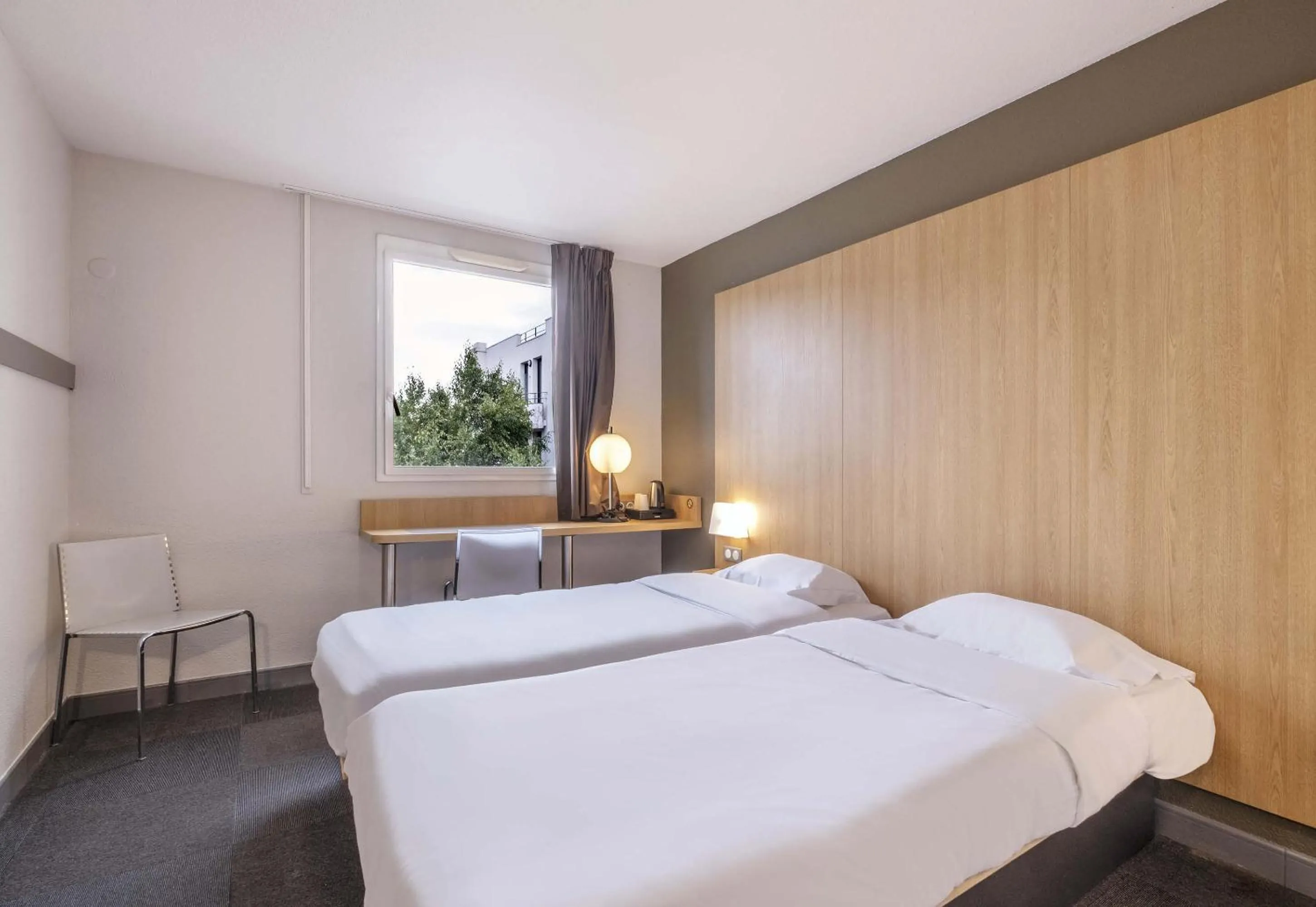 Bedroom, Bed in B&B HOTEL La Rochelle Centre