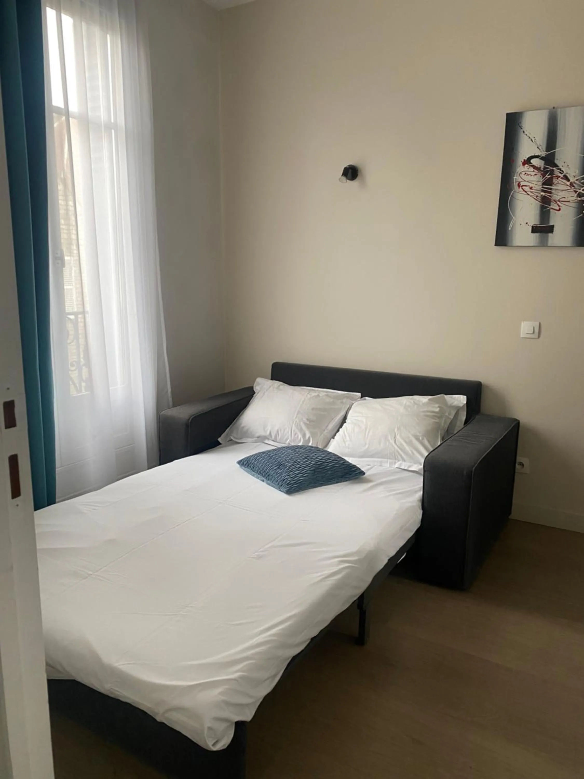 Bed in LOGIS HOTEL - Le Petit Bellon