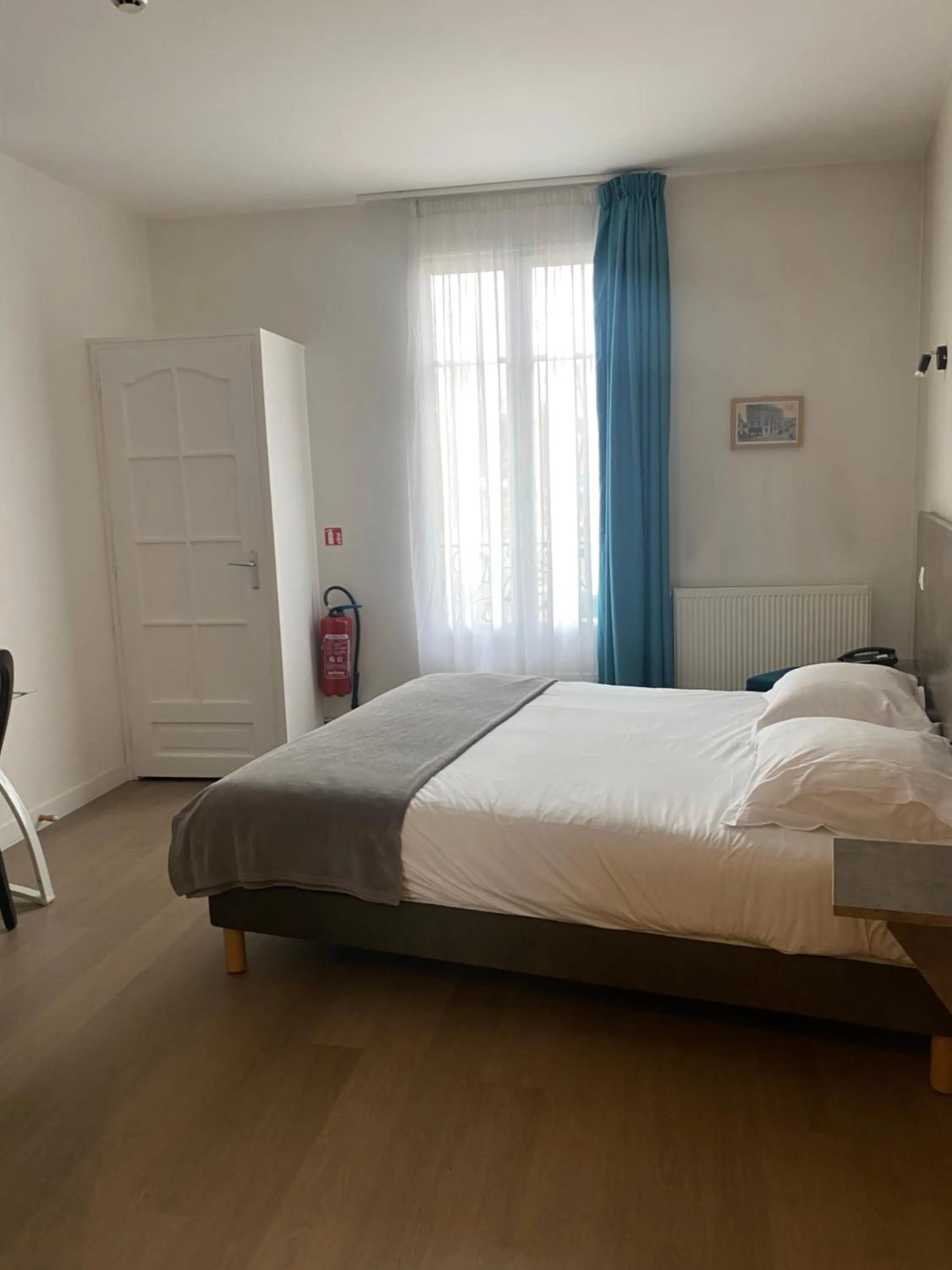 Photo of the whole room, Bed in LOGIS HOTEL - Le Petit Bellon
