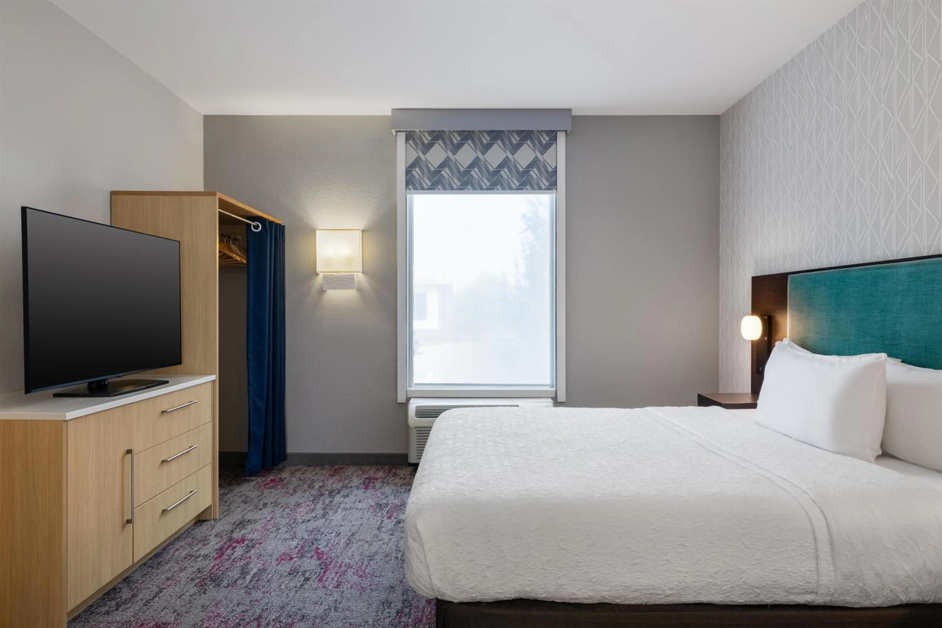 Bed in Home2 Suites by Hilton Milwaukee Brookfield