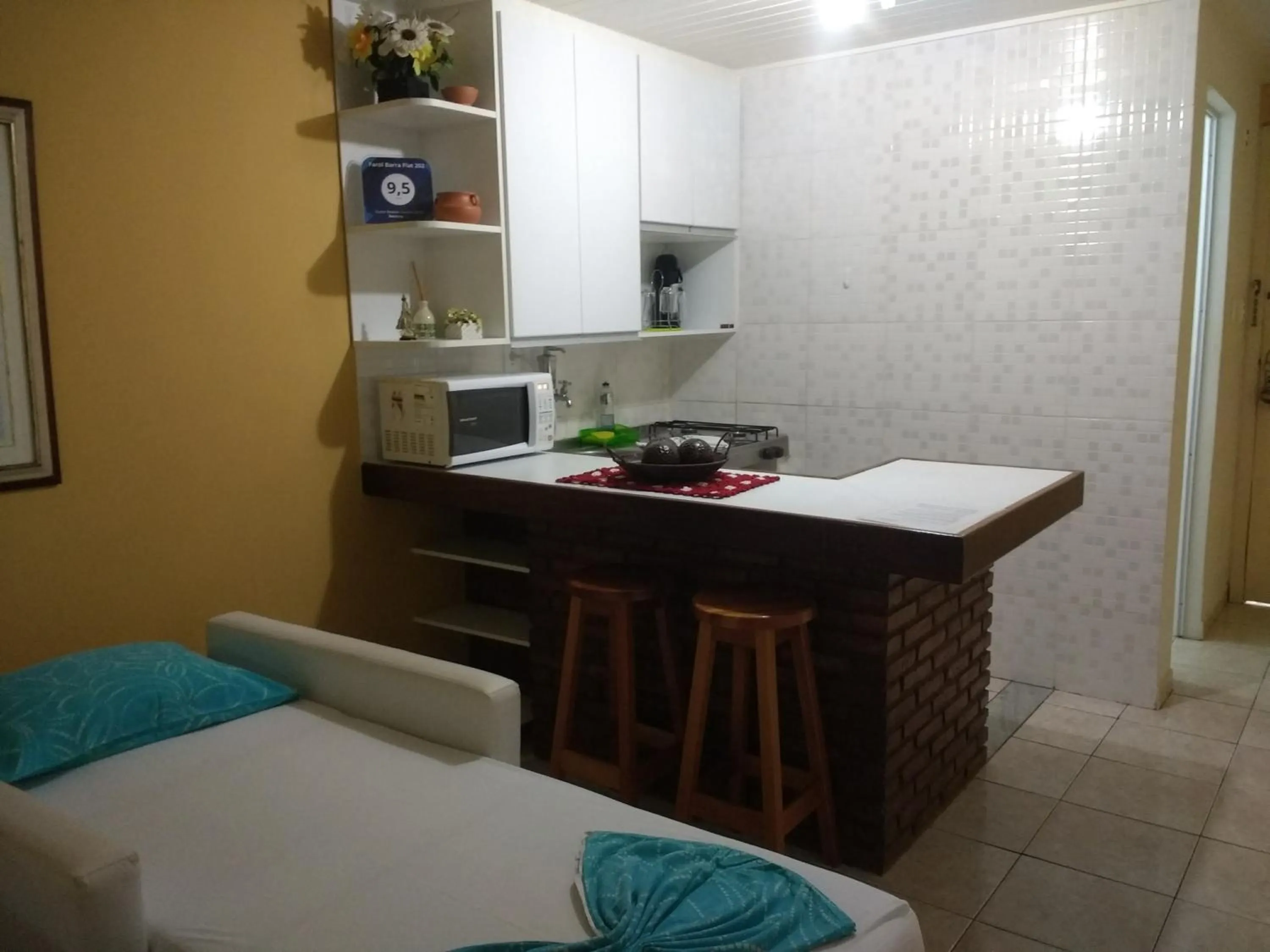 Kitchen or kitchenette, Bed in Farol Barra Flat 202