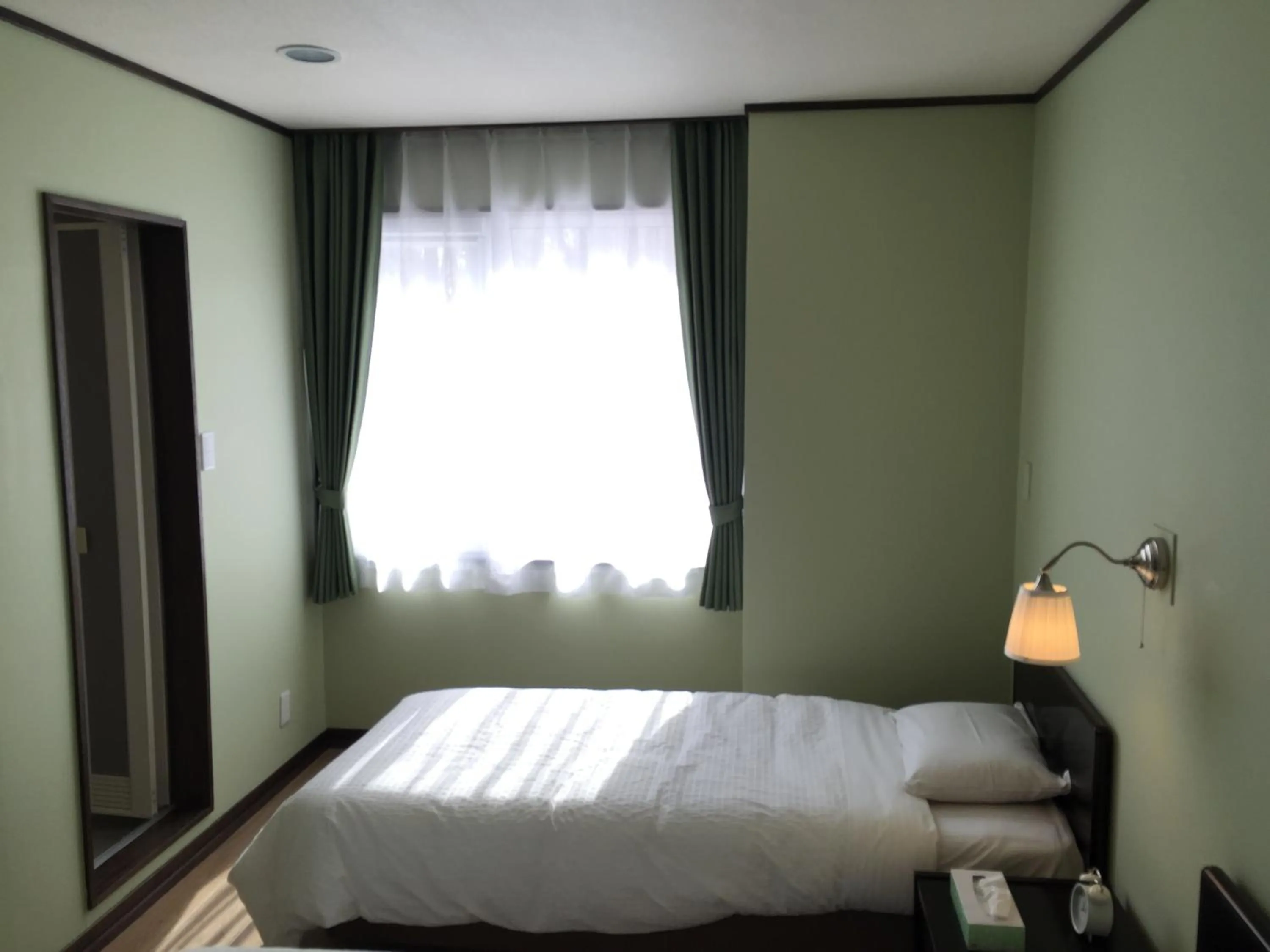 Bed in White Rose Inn