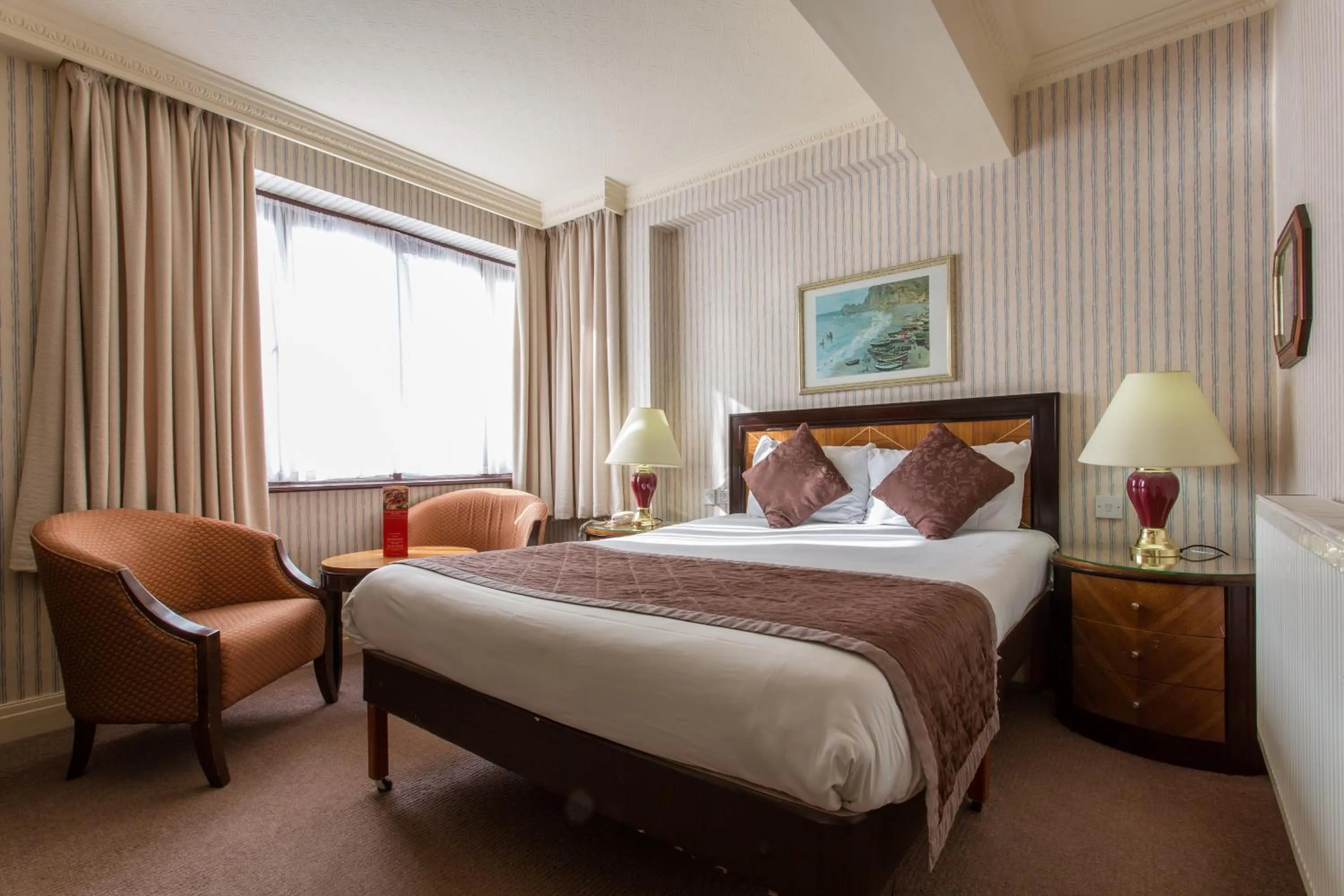 Bed in Britannia Country House Hotel