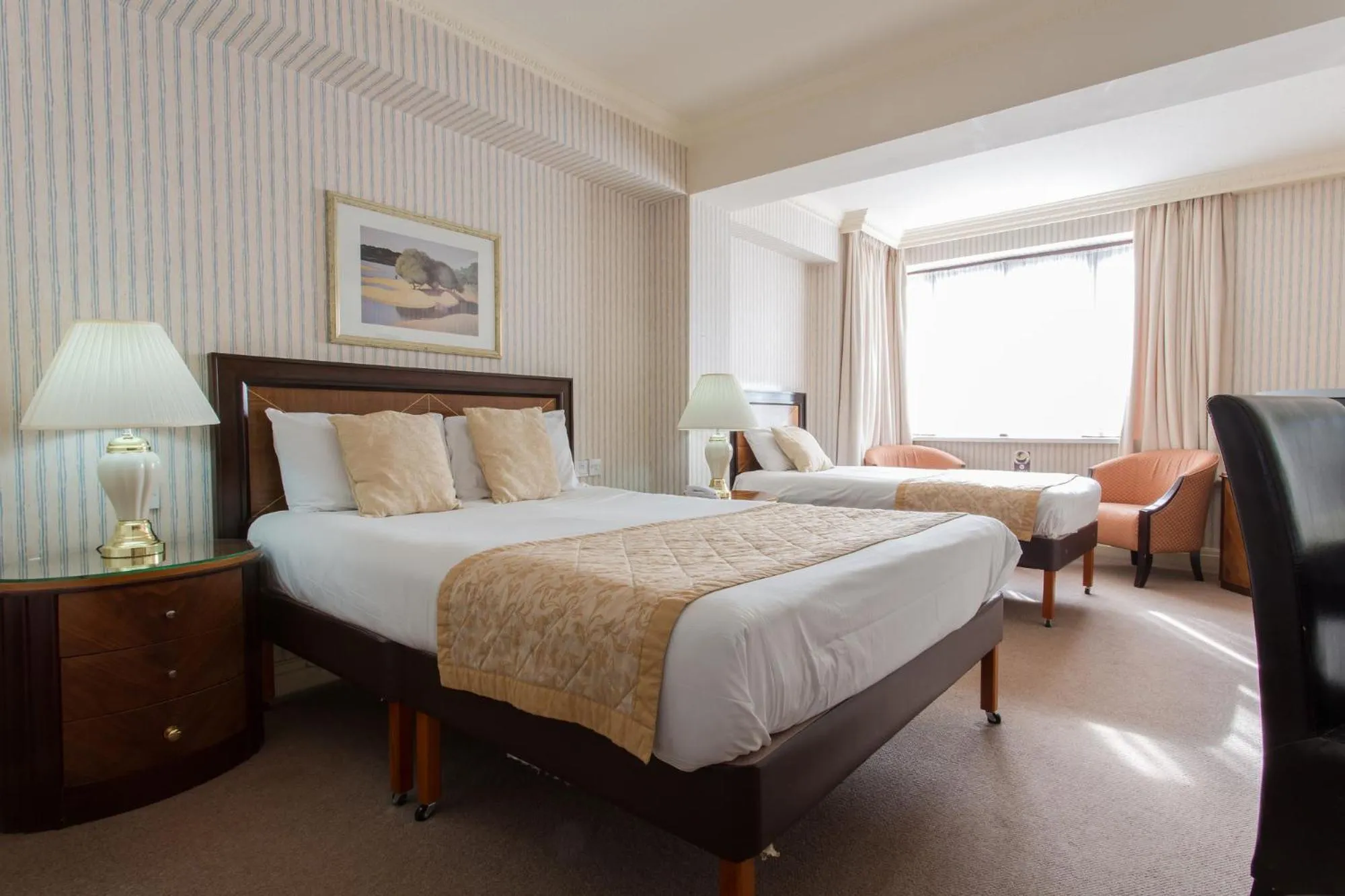 Bed in Britannia Country House Hotel