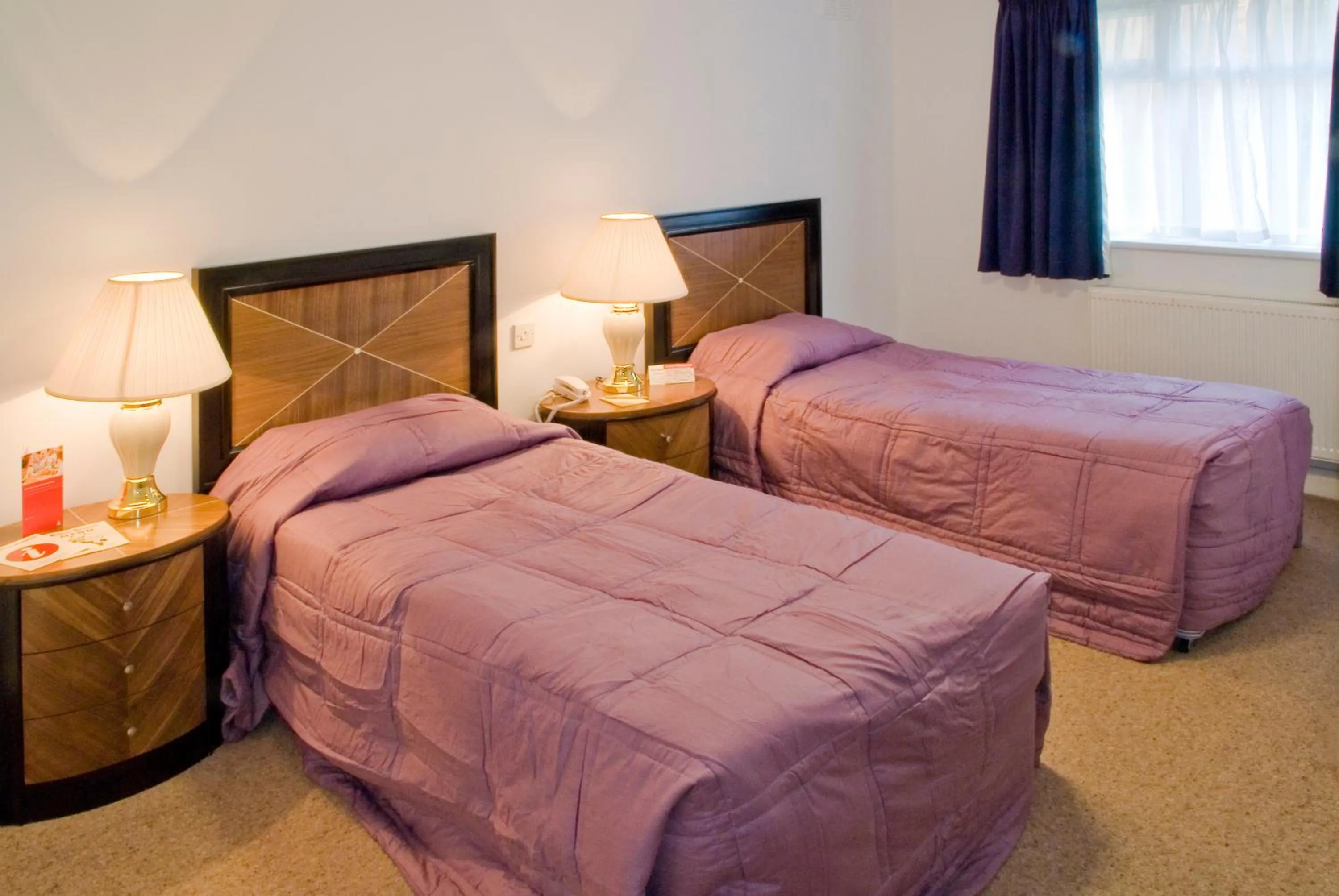 Bed in Britannia Country House Hotel