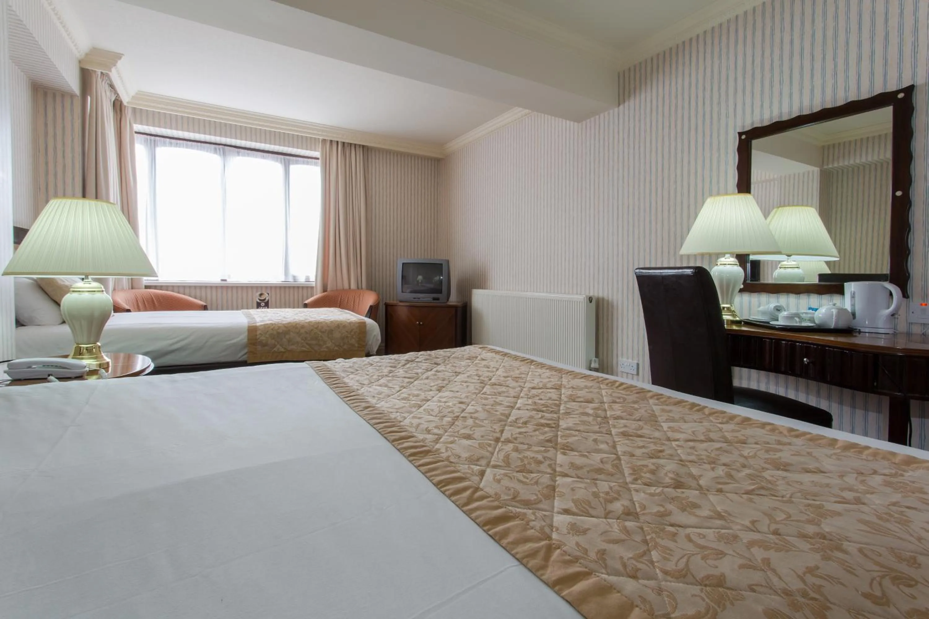 Bedroom in Britannia Country House Hotel