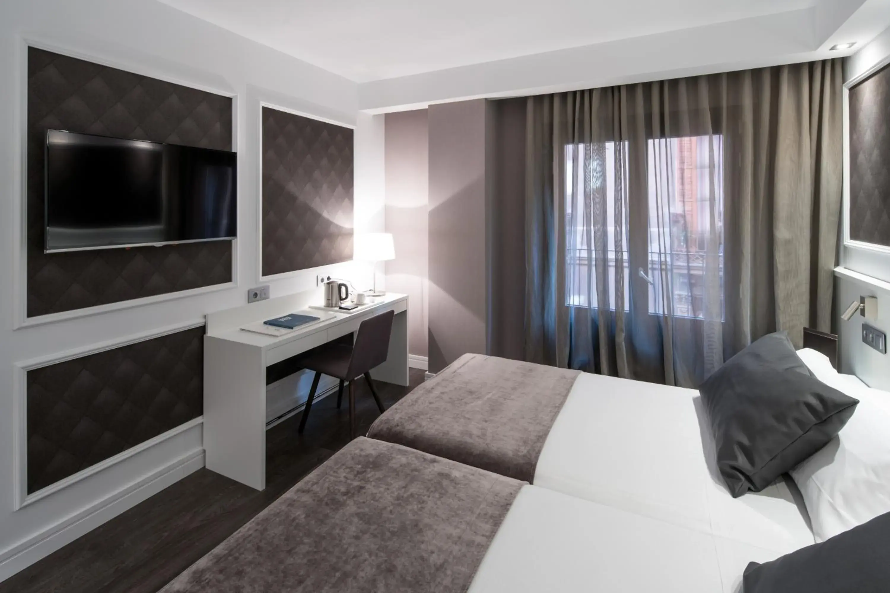 Quadruple Room (2 Adults + 2 Children) in Catalonia Magdalenes Quadruple Room (2 Adults + 2 Children) in Catalonia Magdalenes