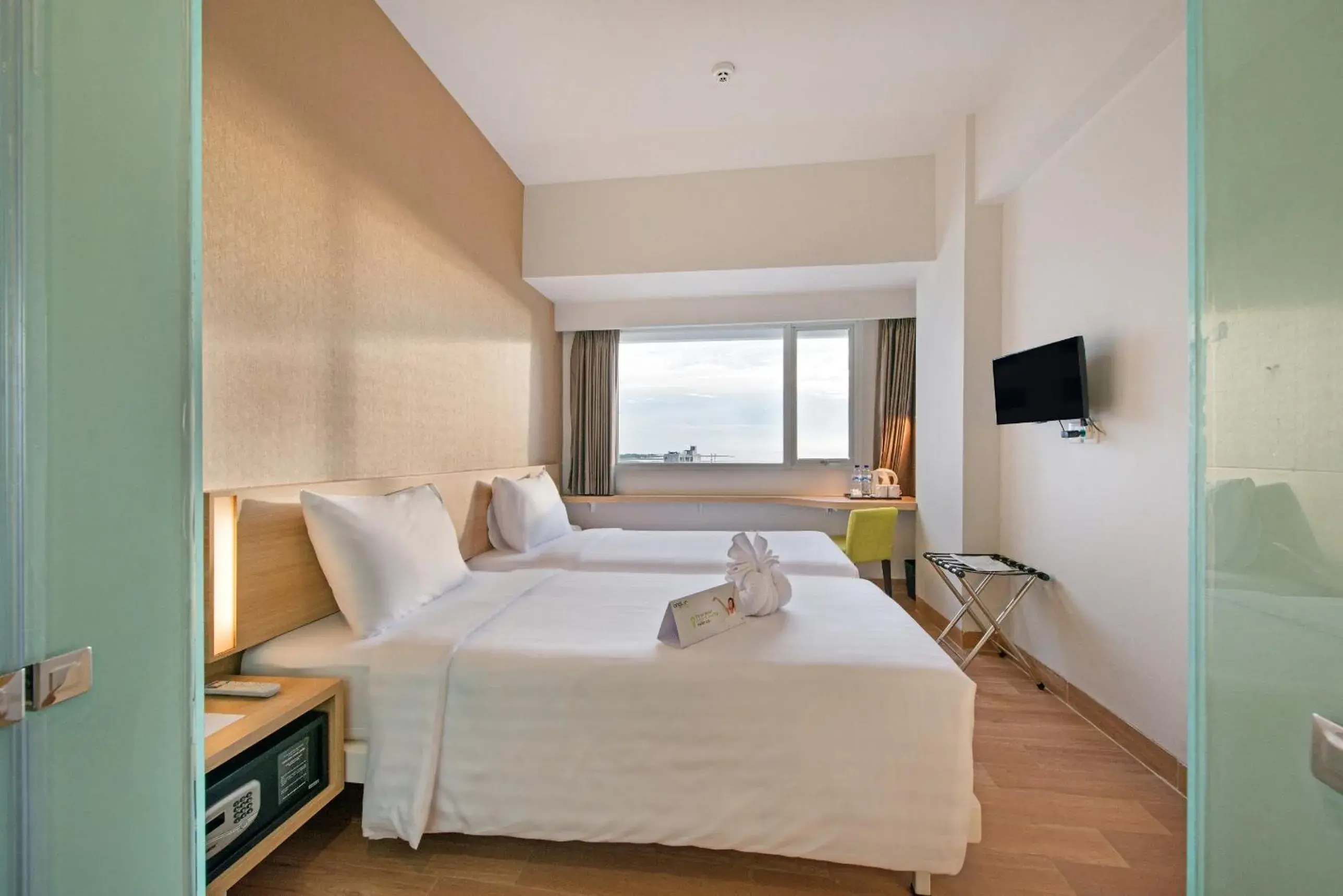 Superior Twin Room in Whiz Prime Hotel Hasanuddin Makassar Superior Twin Room in Whiz Prime Hotel Hasanuddin Makassar