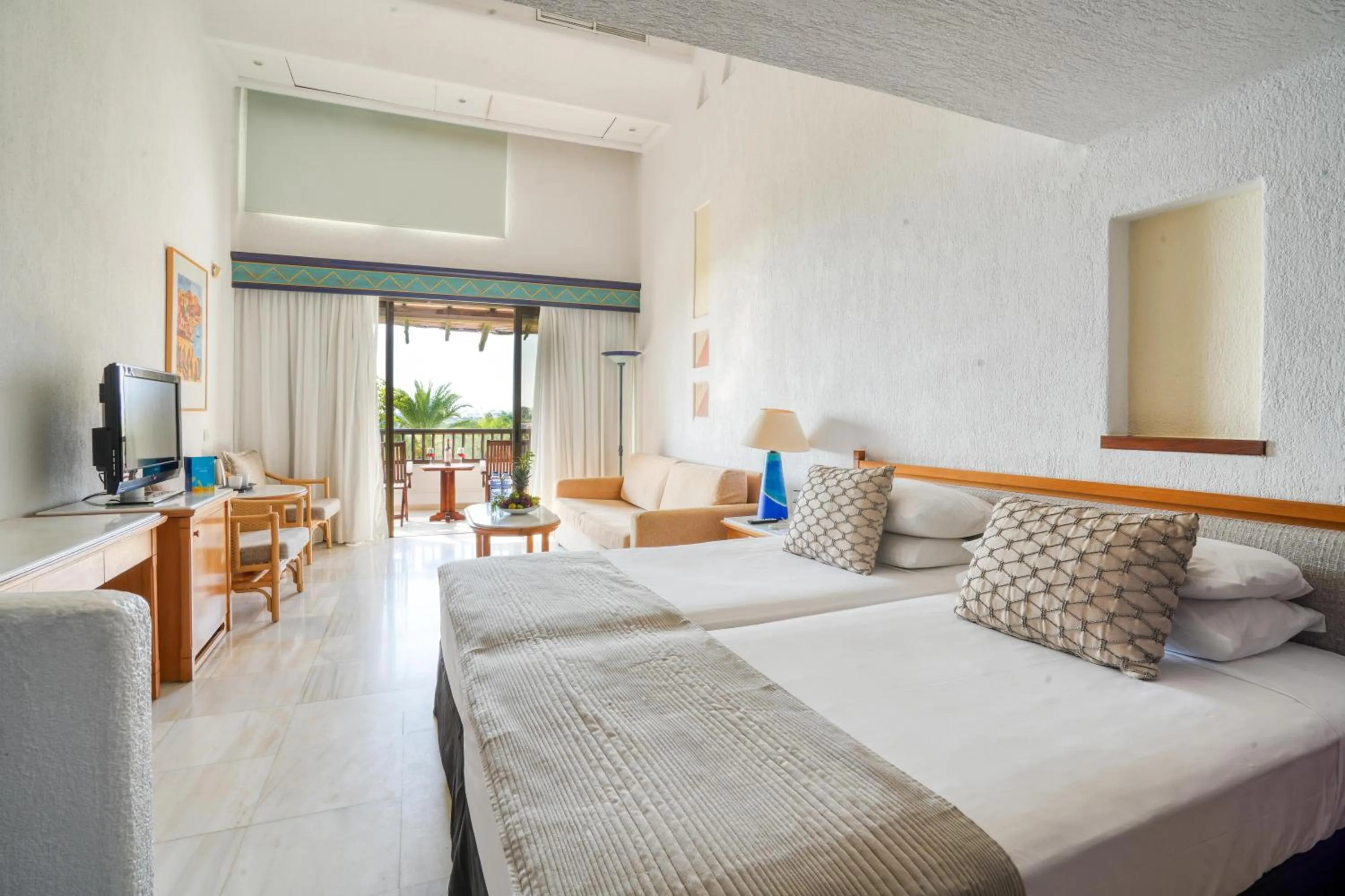 Photo of the whole room, Bed in Coral Beach Hotel & Resort Cyprus