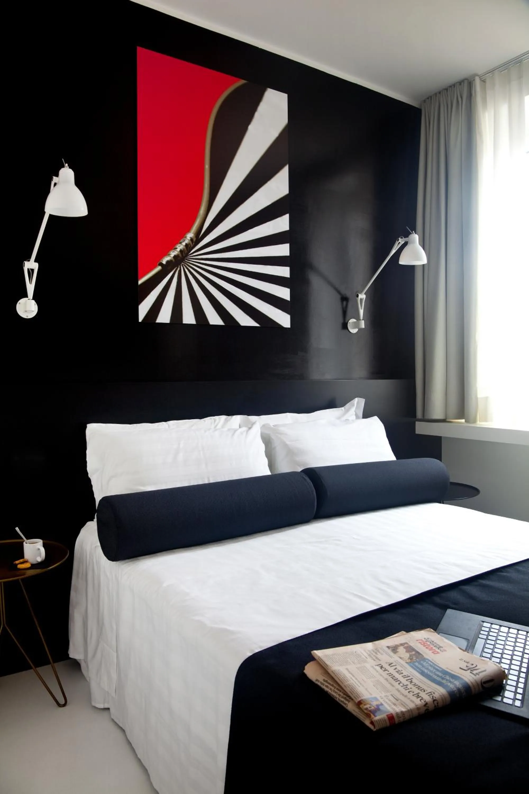 Bed in Sora Luxury Inn