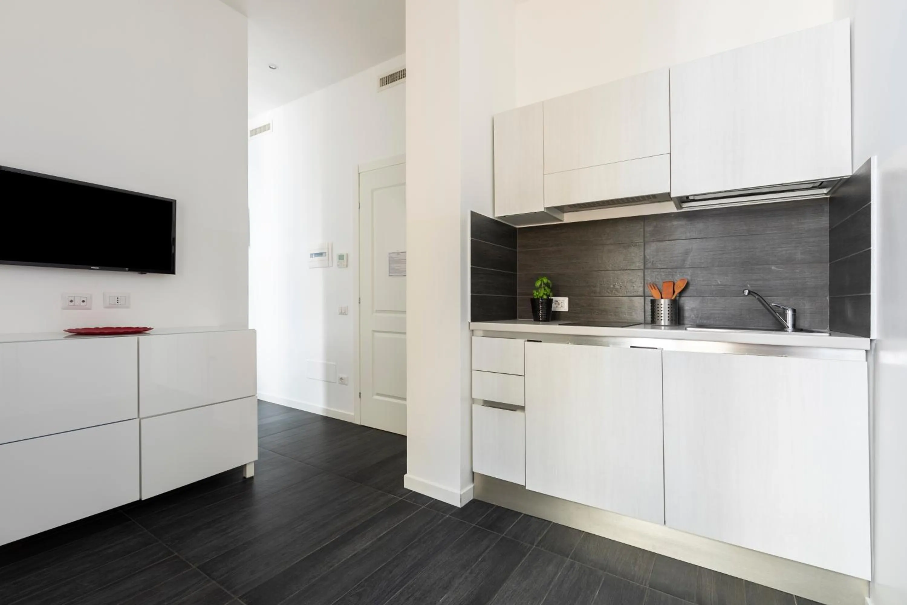 Kitchen or kitchenette in Vatican City Suites by Hili