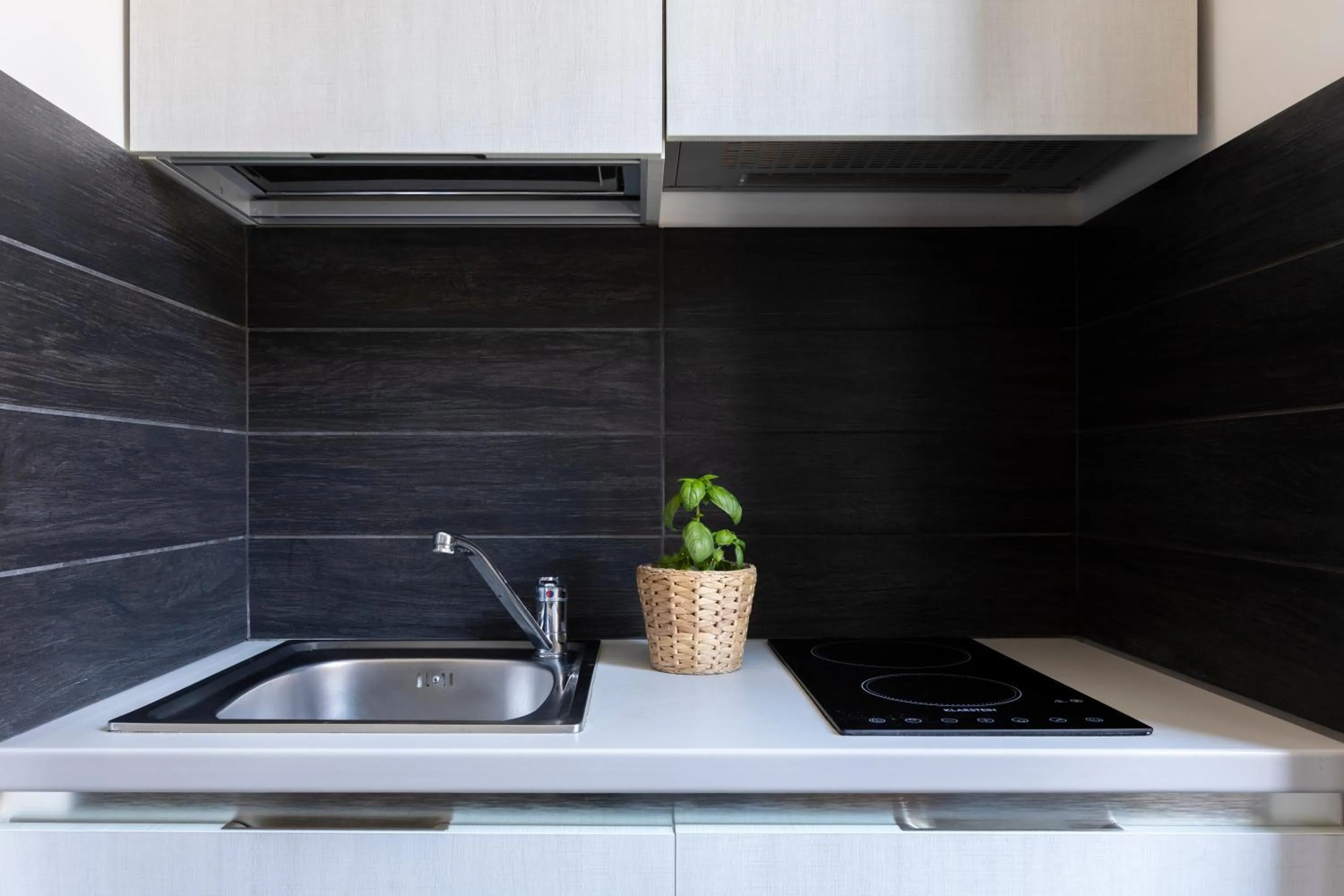 Kitchen or kitchenette in Vatican City Suites by Hili