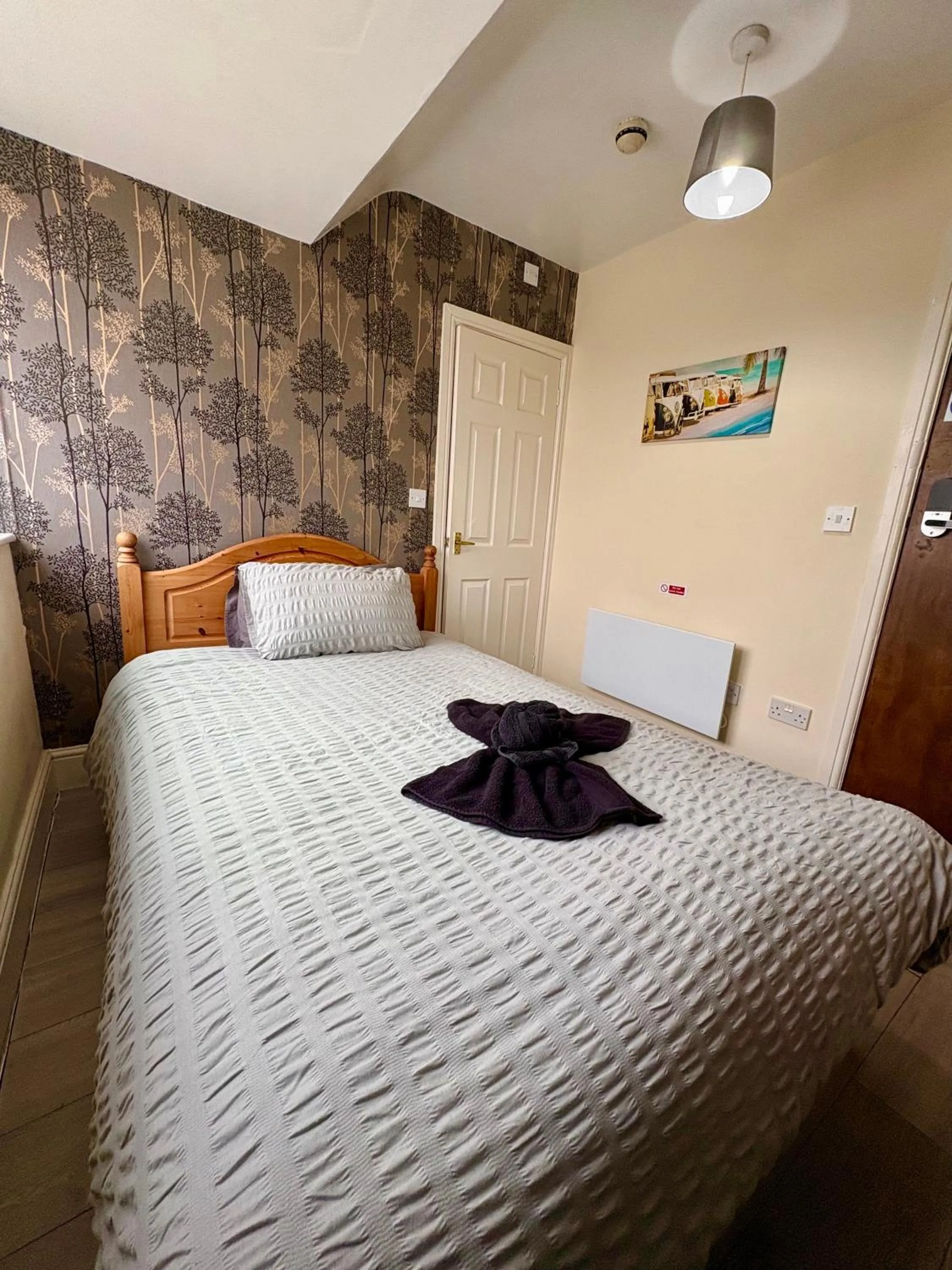 Bed in Travellers Rest Motel