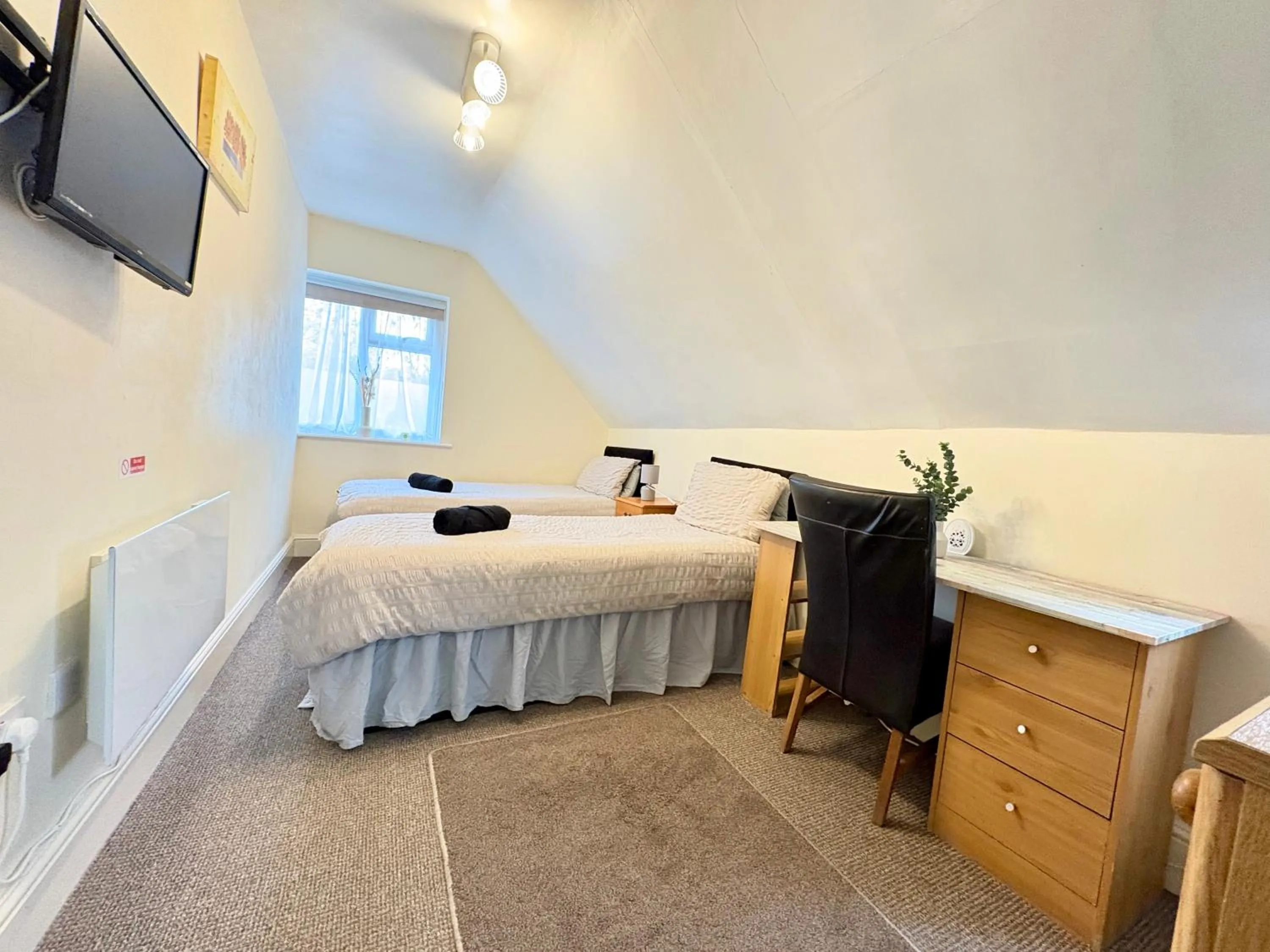 Bed in Travellers Rest Motel