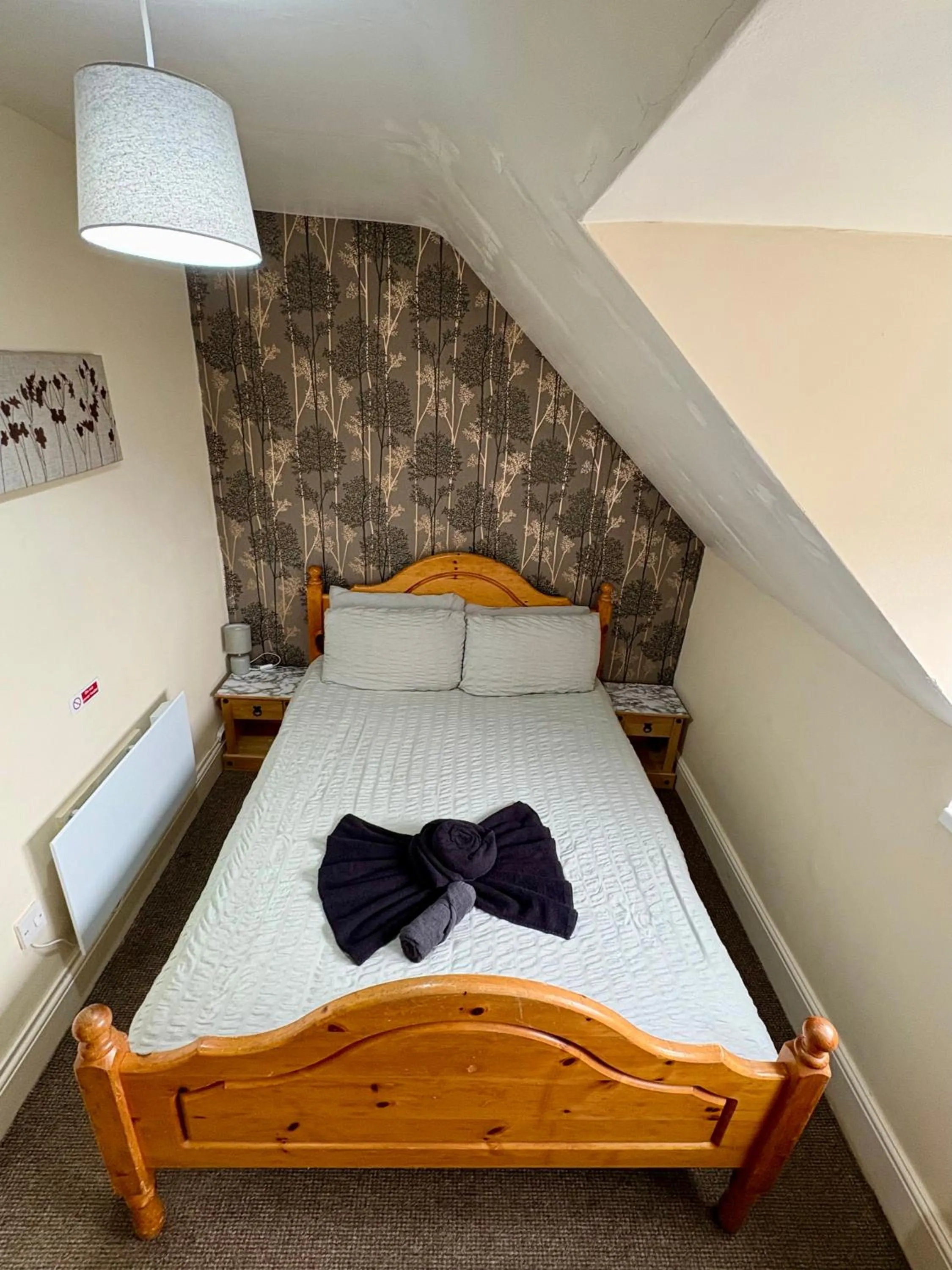 Bed in Travellers Rest Motel