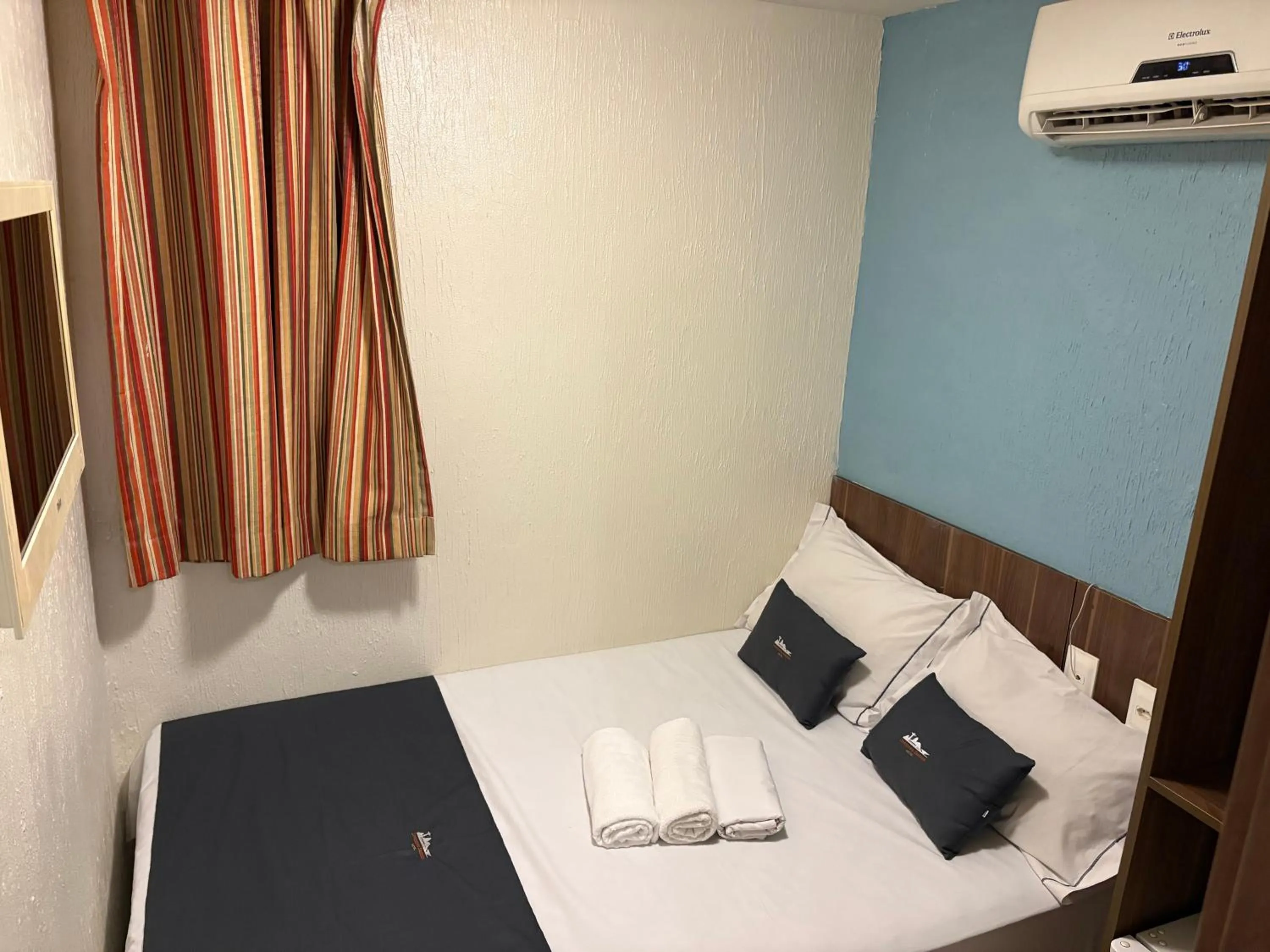 Bed in Downtown Santana Hotel