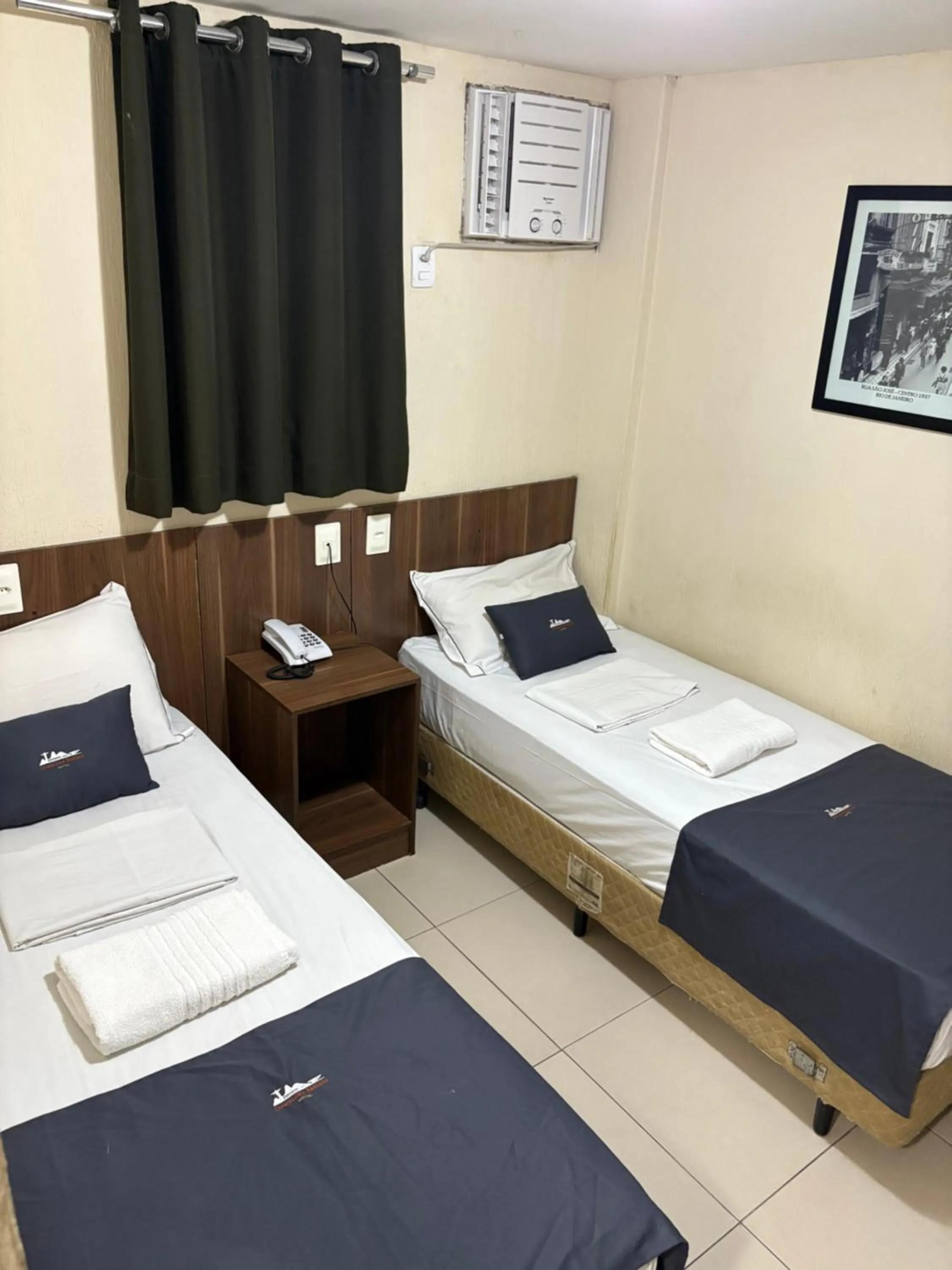 Bed in Downtown Santana Hotel