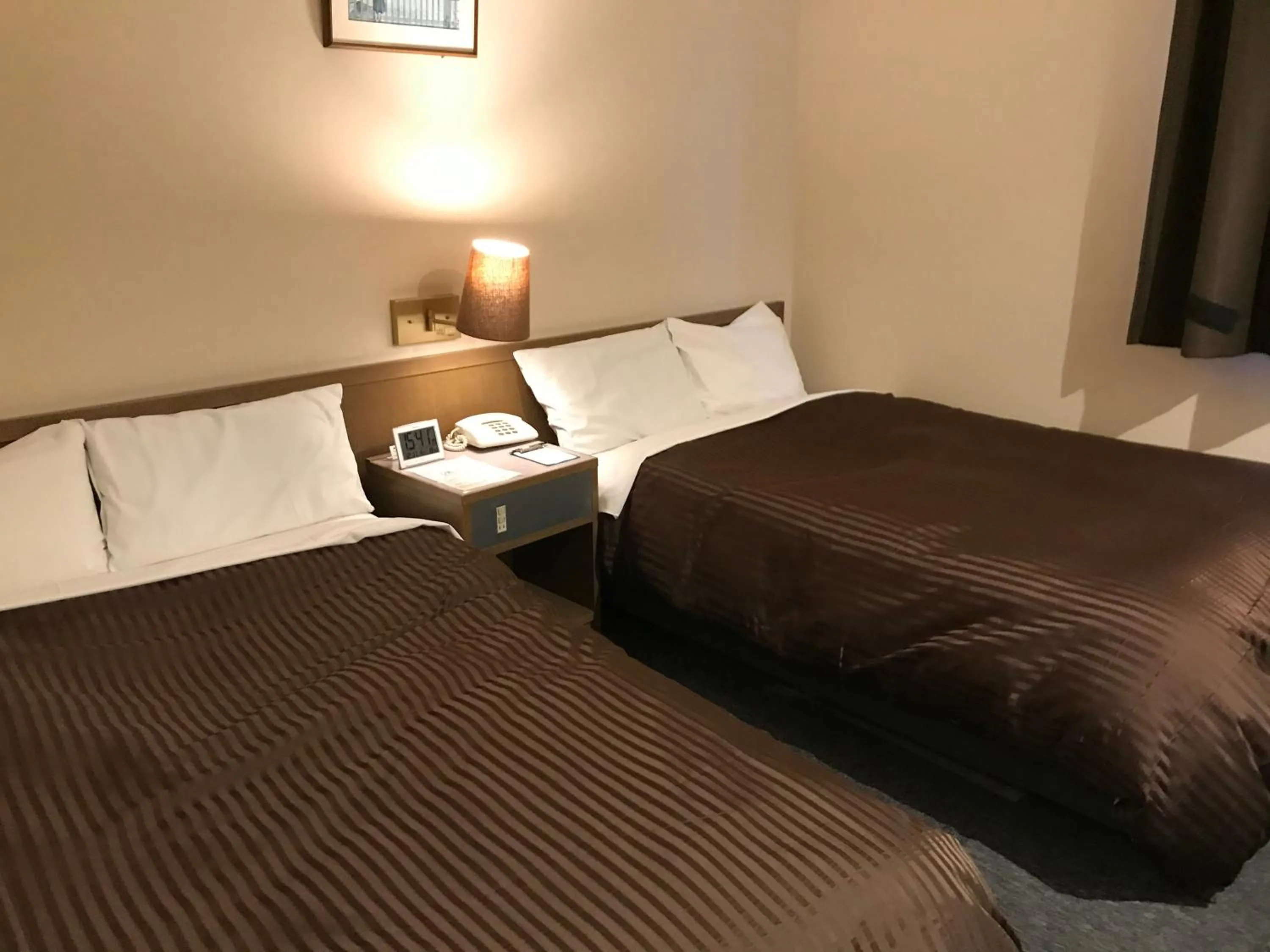 Bed in Hotel Avan Sukumo