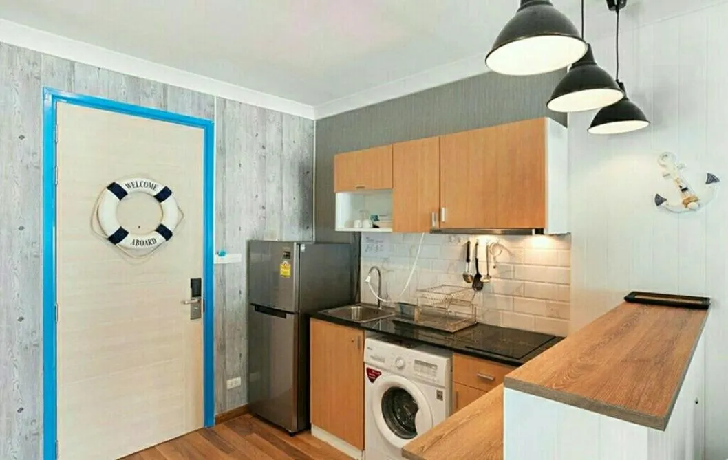 Kitchen or kitchenette in My Resort Family by Jitkarn