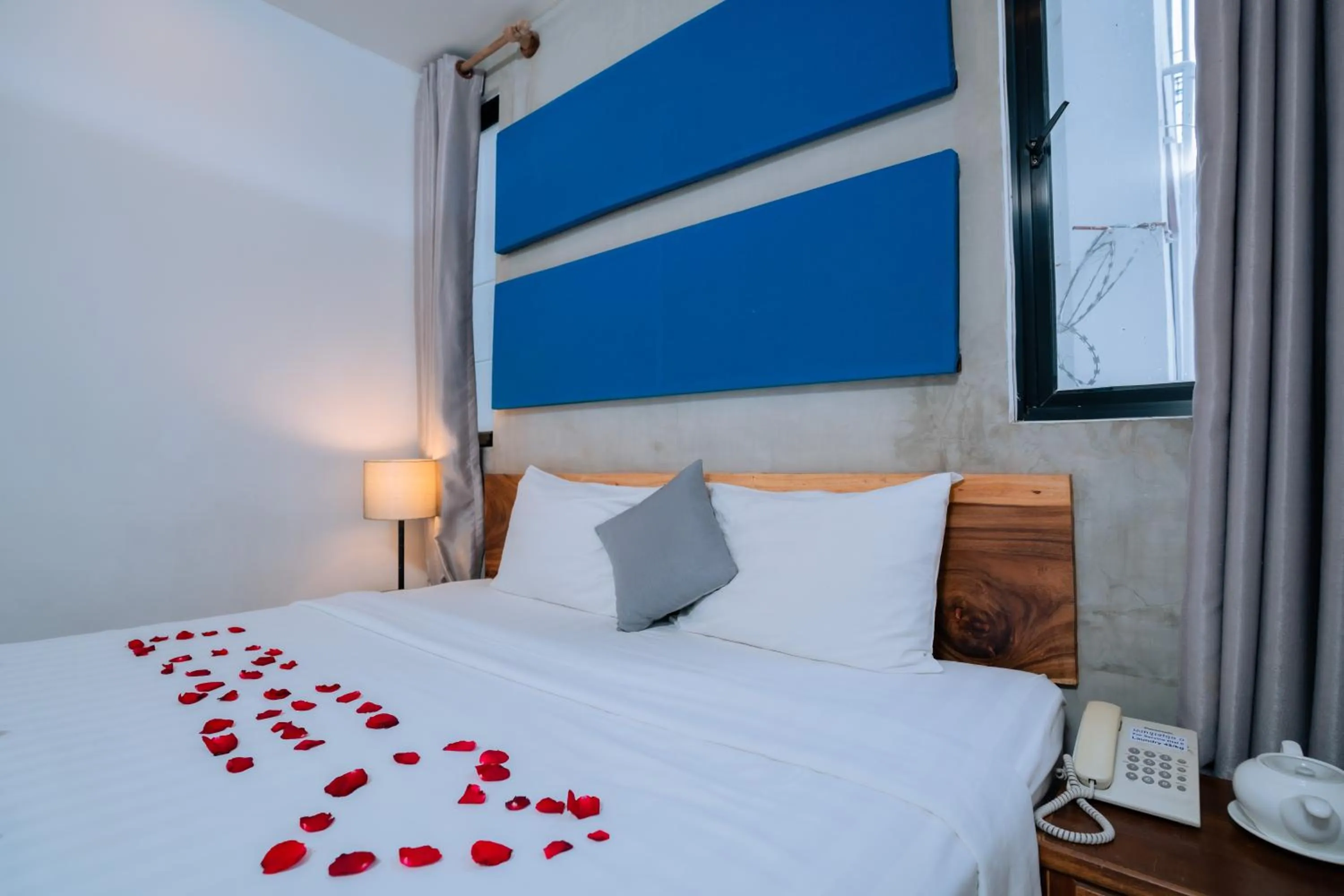 Bed in Home Chic Hotel