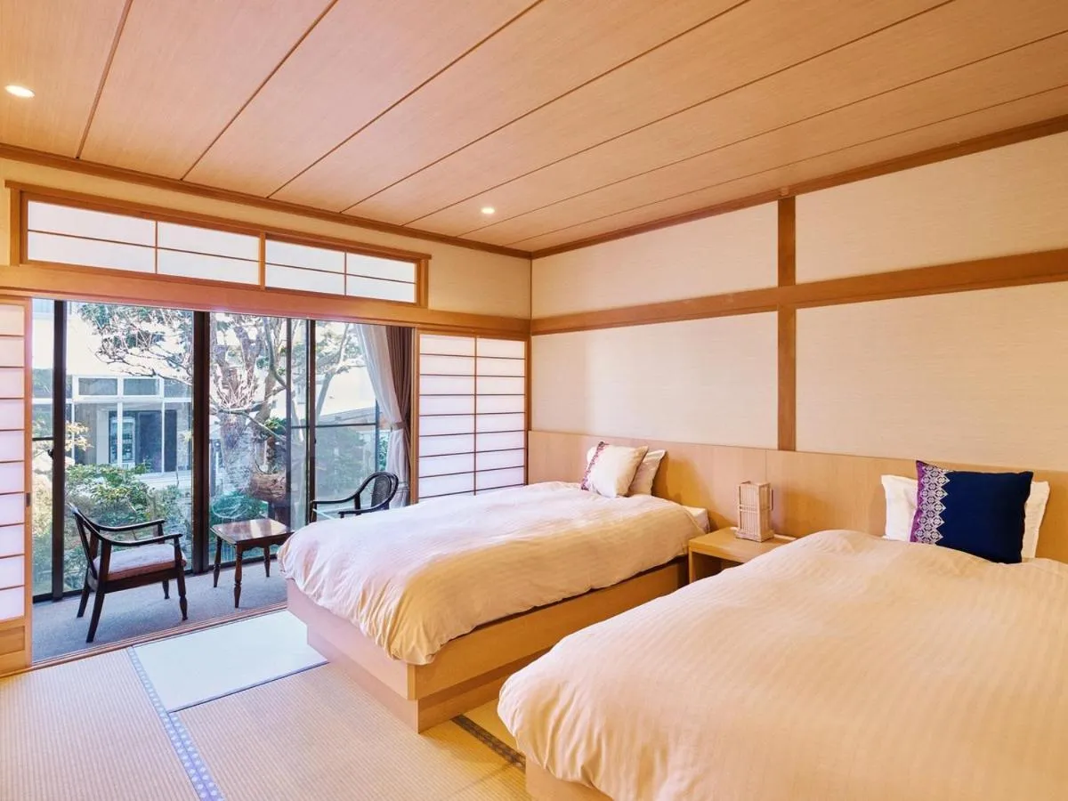 Photo of the whole room, Bed in Tsubakikan
