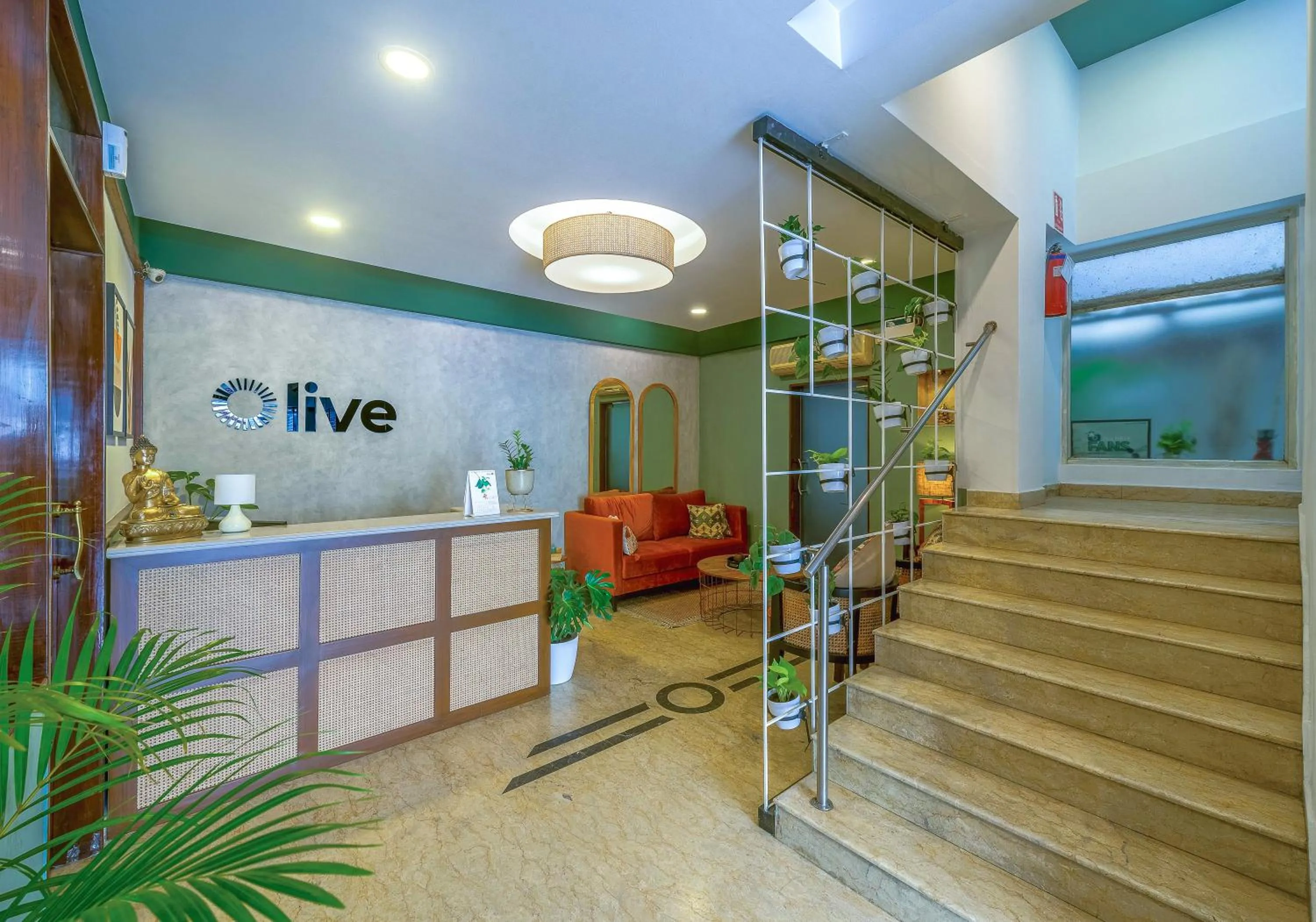 Lobby or reception in Olive Zip Rest House Road by Embassy Group