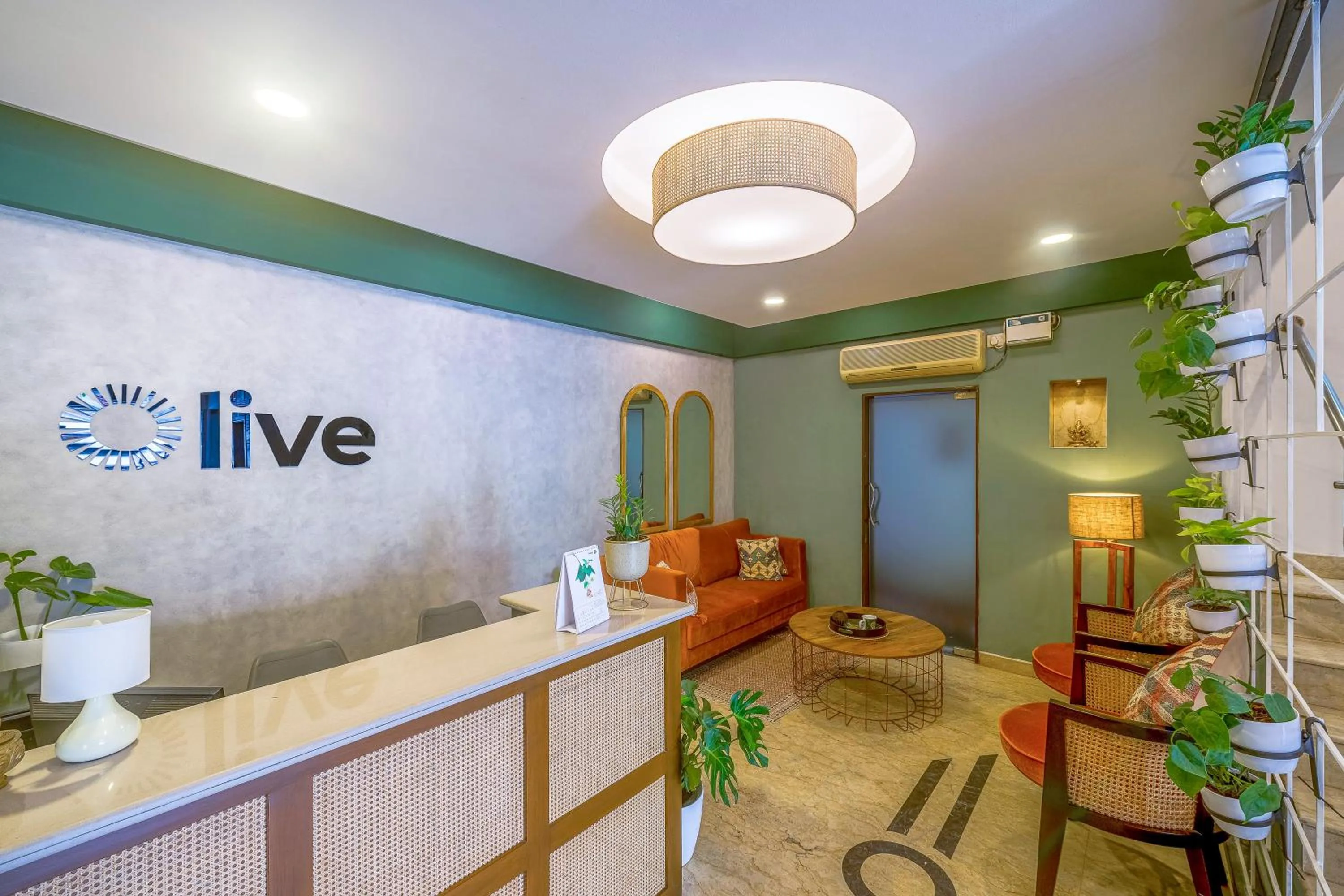 Lobby or reception in Olive Zip Rest House Road by Embassy Group