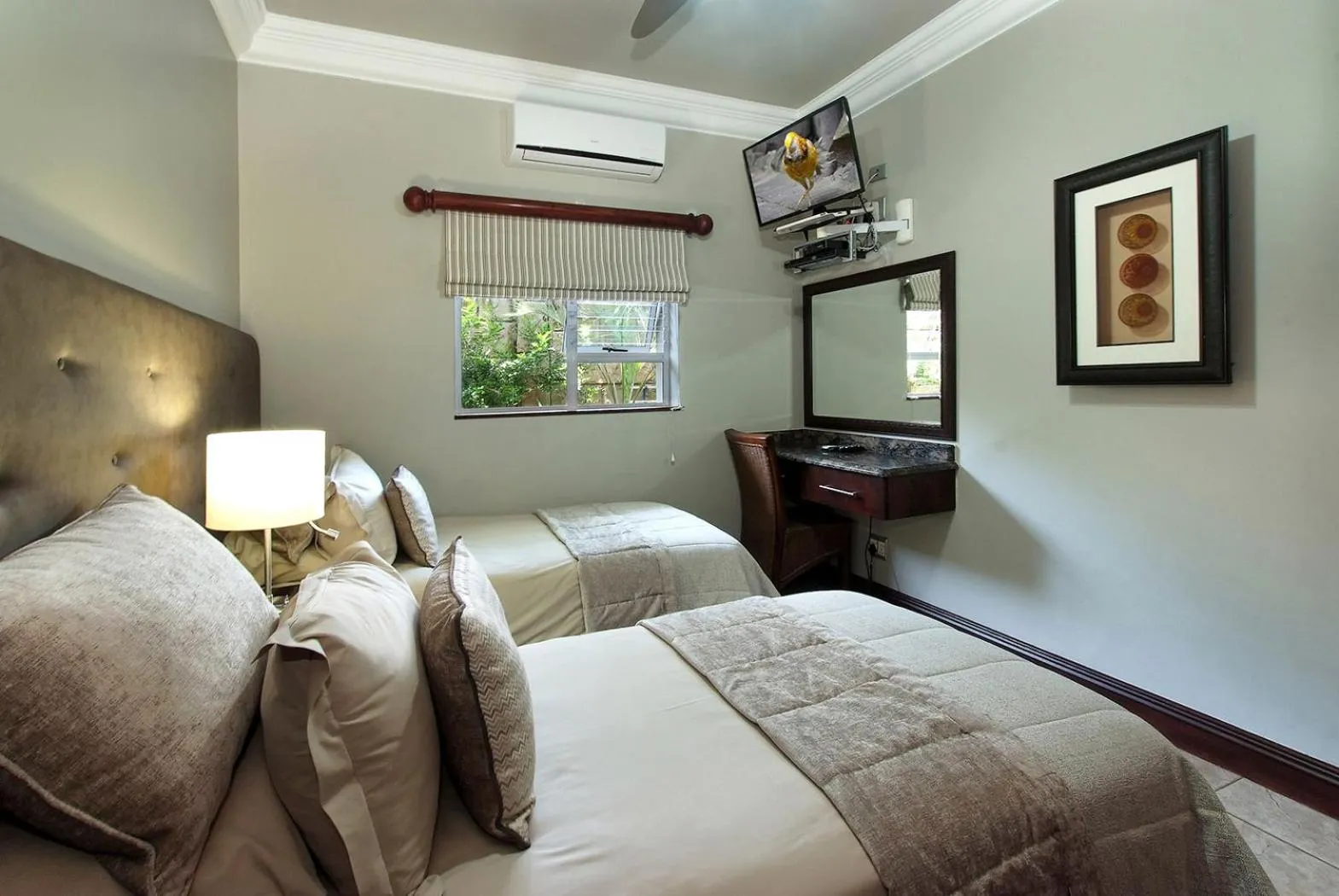 Bed in uShaka Manor Guest House